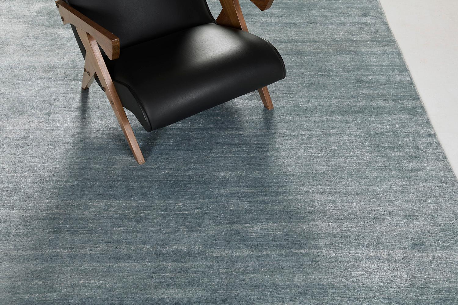 Dara' is a most sought after rug in Elan Collection in the mesmerizing teal shade. Its simplicity does not take away from the rug's luxurious quality and beautiful sheen made of bamboo silk. Dara is a fabulous rug for any design space. 

Rug