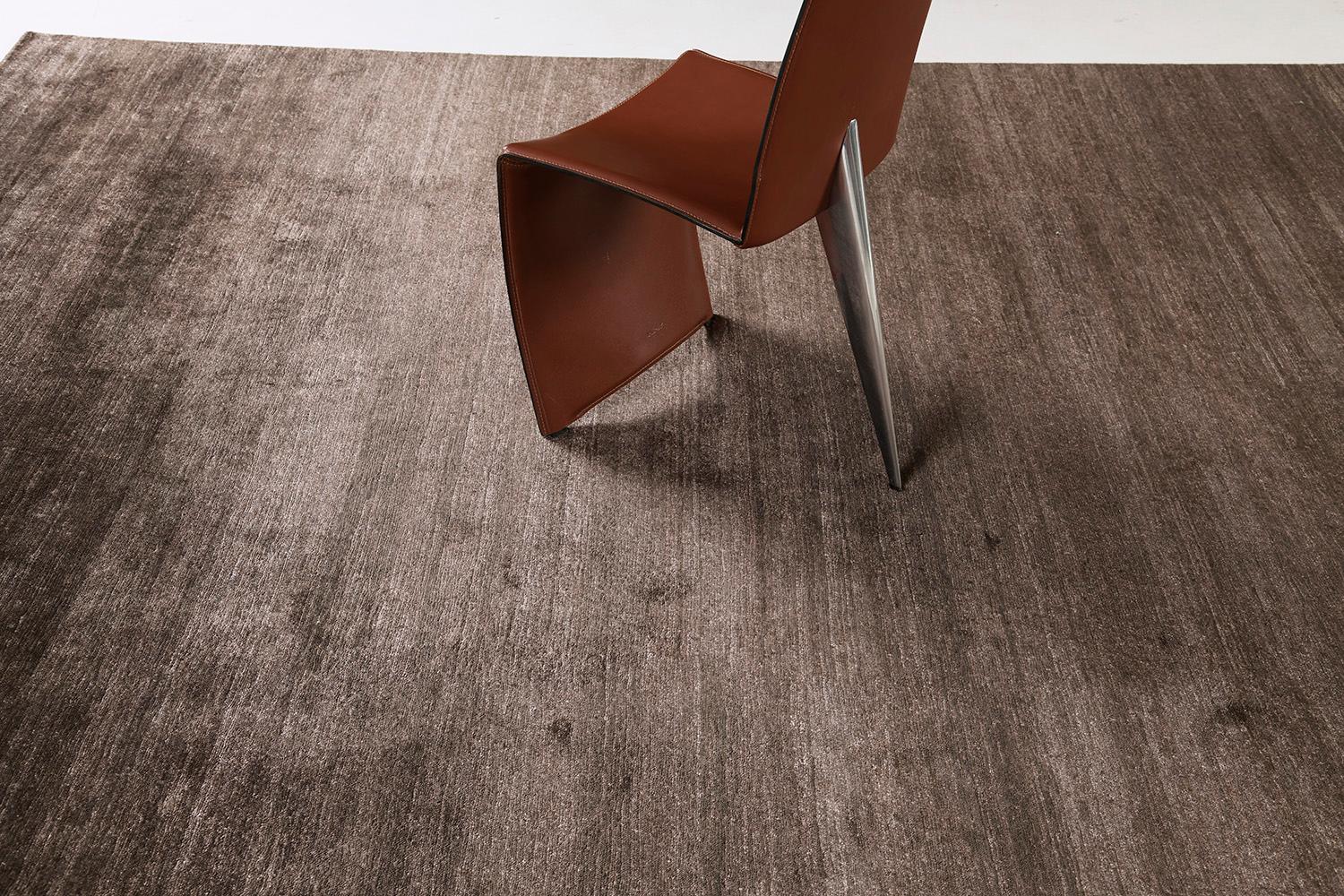 Dara' is a most sought after rug in Elan Collection in the mesmerizing shade of chocolate brown. Its simplicity does not take away from the rug's luxurious quality and beautiful sheen made of bamboo silk. Dara is a fabulous rug for any design
