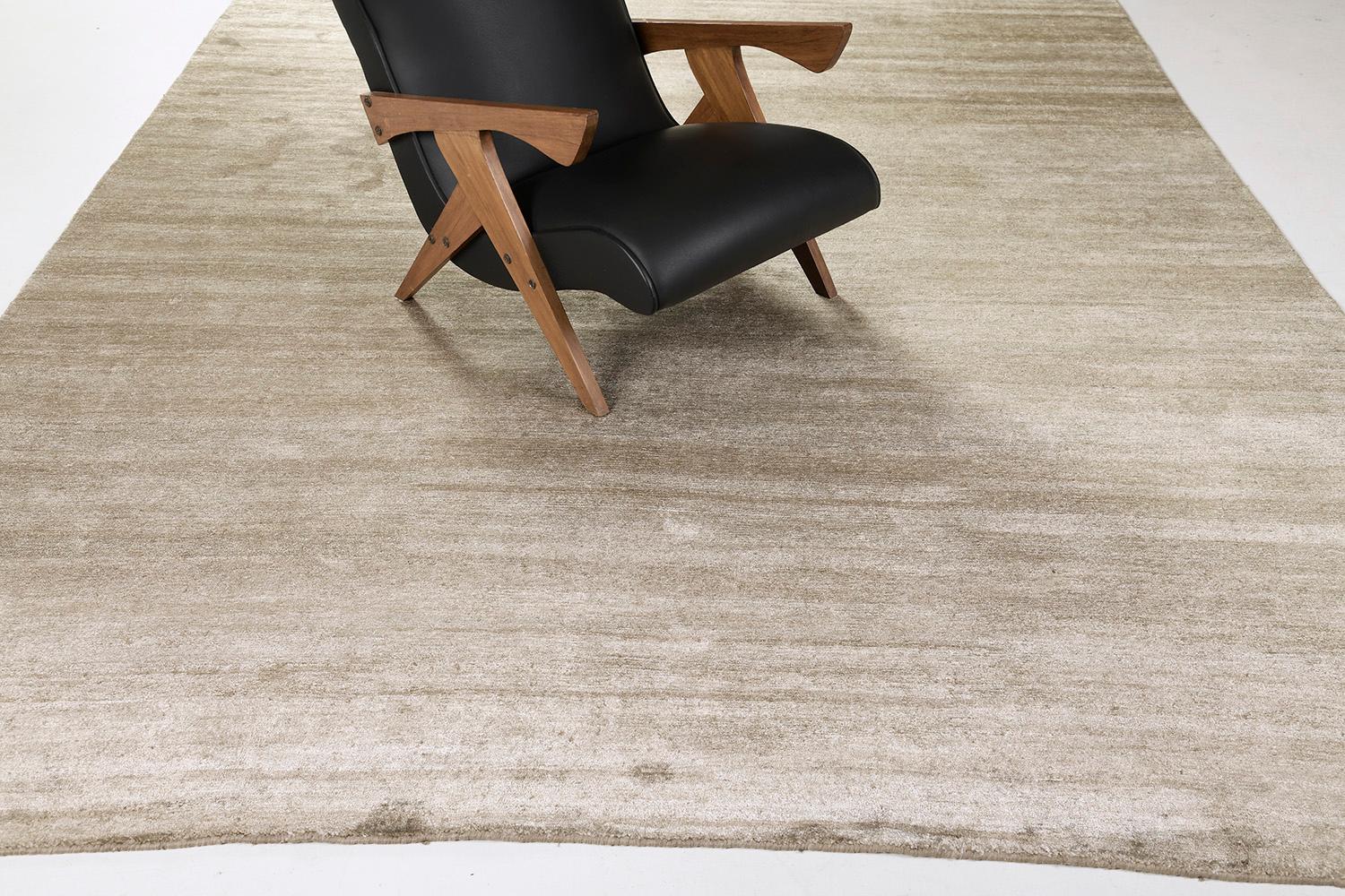 Dara' is a most sought after rug in Elan Collection in the mesmerizing shade of tan. Its simplicity does not take away from the rug's luxurious quality and beautiful sheen made of bamboo silk. Dara is a fabulous rug for any design space.

Rug