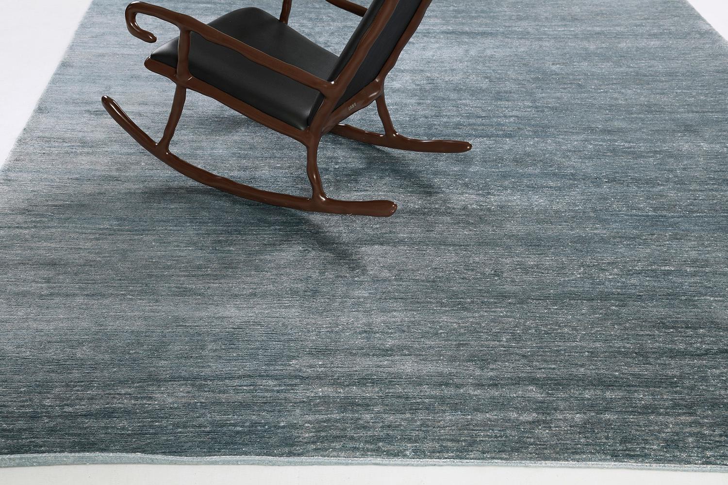 Dara' is a most sought after rug in Elan Collection in the mesmerizing shade of sky blue. Its simplicity does not take away from the rug's luxurious quality and beautiful sheen made of bamboo silk. Dara is a fabulous rug for any design space.

Rug