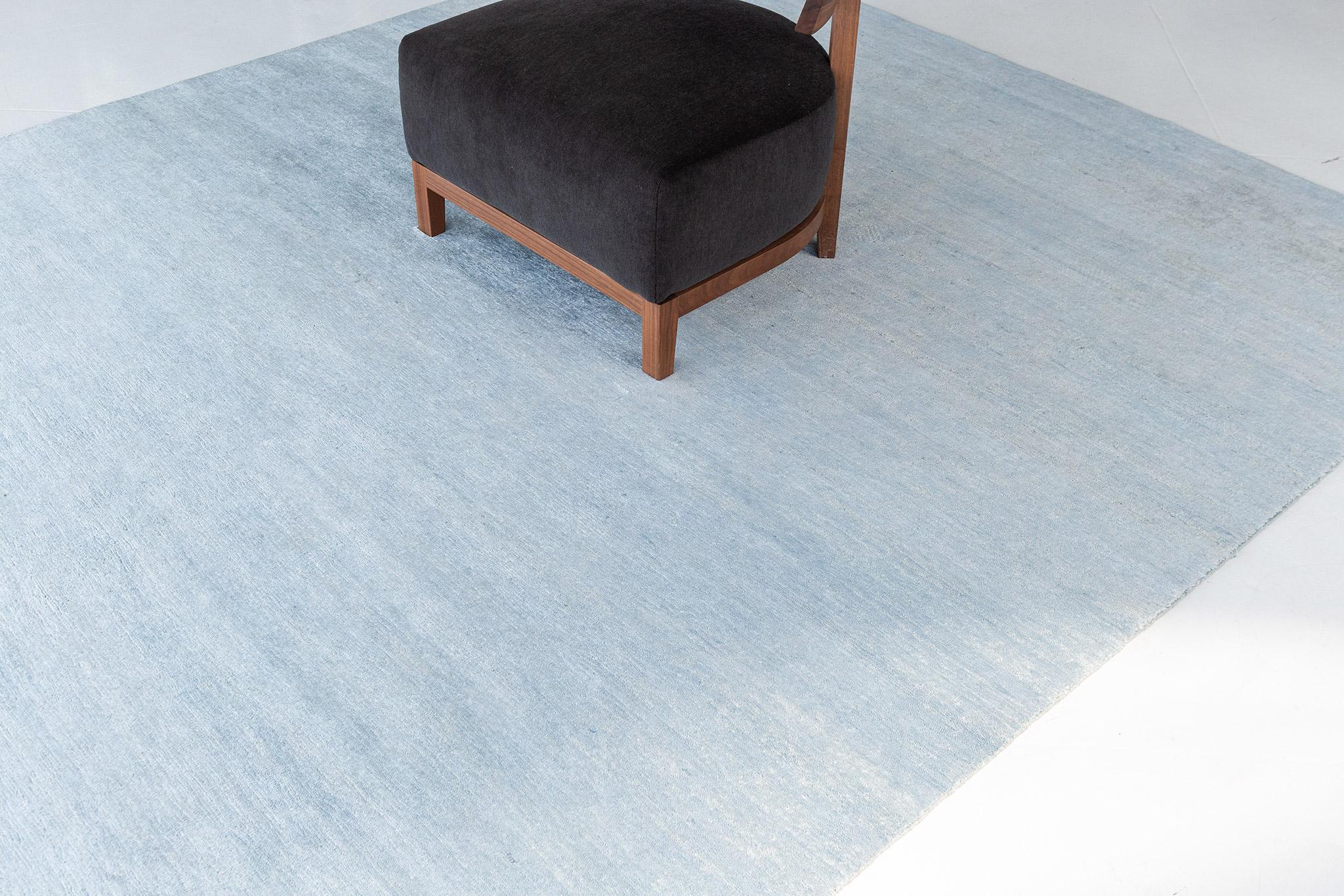 Dara' is a solid bamboo silk rug in the stunning cool sky blue tones. Its simplicity does not take away from the rug's luxurious quality and beautiful sheen. Dara is a splendid rug for any design space.

Rug Number
24585
Size
7' 5