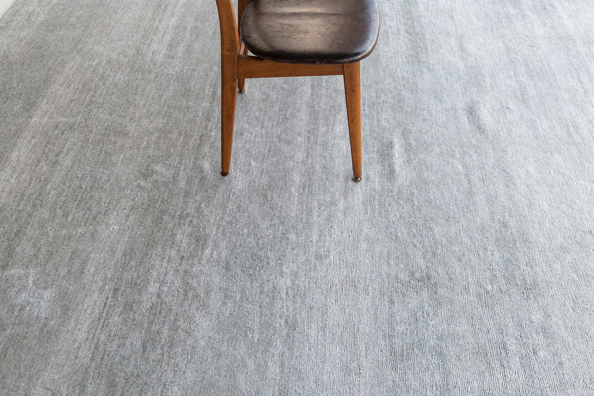 Dara' is a solid bamboo silk rug in the perfect gray tone. Its simplicity does not take away from the rug's luxurious quality and beautiful sheen. Dara is a splendid rug for any design space.

Rug Number
21708
Size
7.11