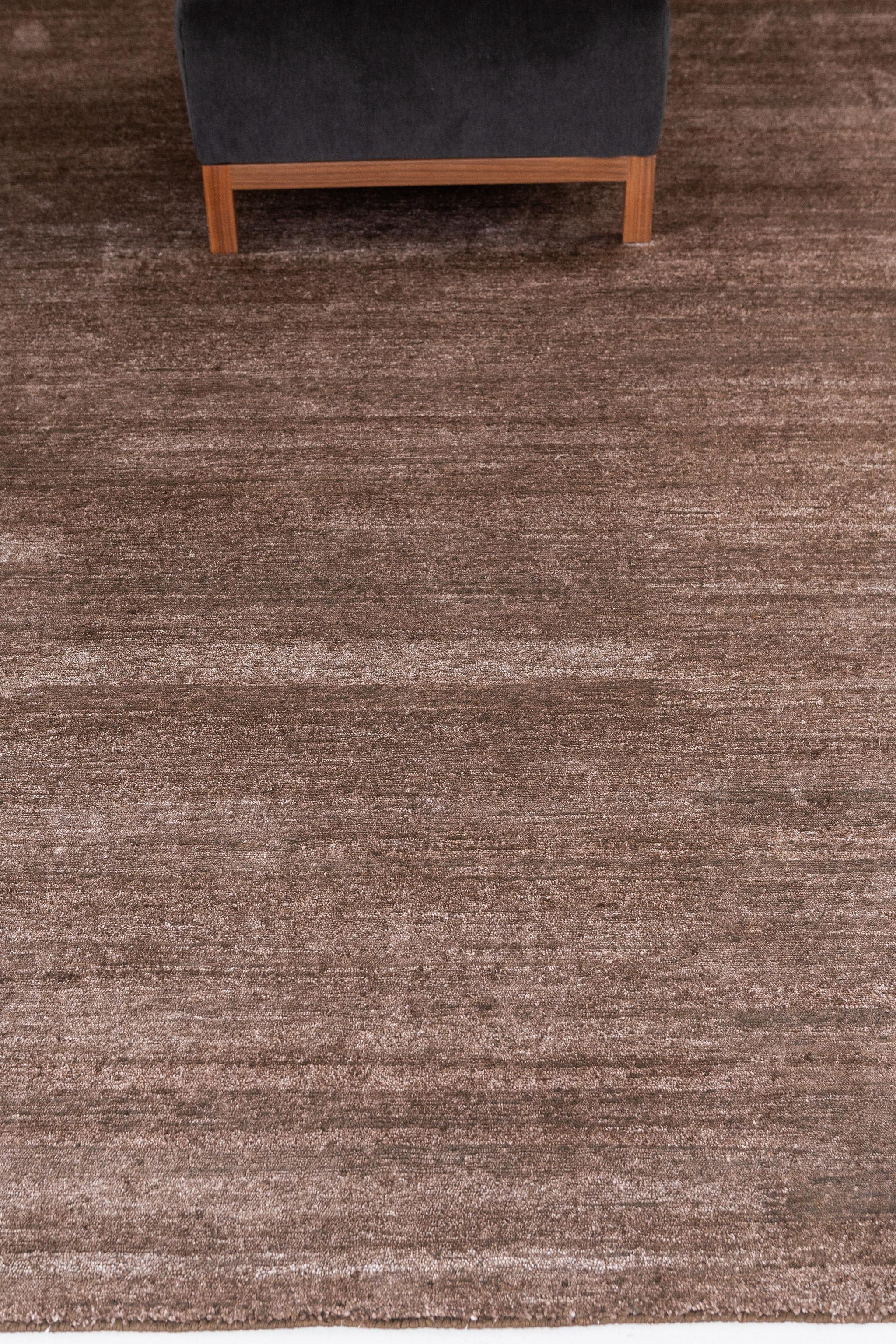 Dara' is a solid bamboo silk rug in the stunning earthy tones. Its simplicity does not take away from the rug's luxurious quality and beautiful sheen. Dara is a splendid rug for any design space.

Rug Number
24584
Size
7' 11