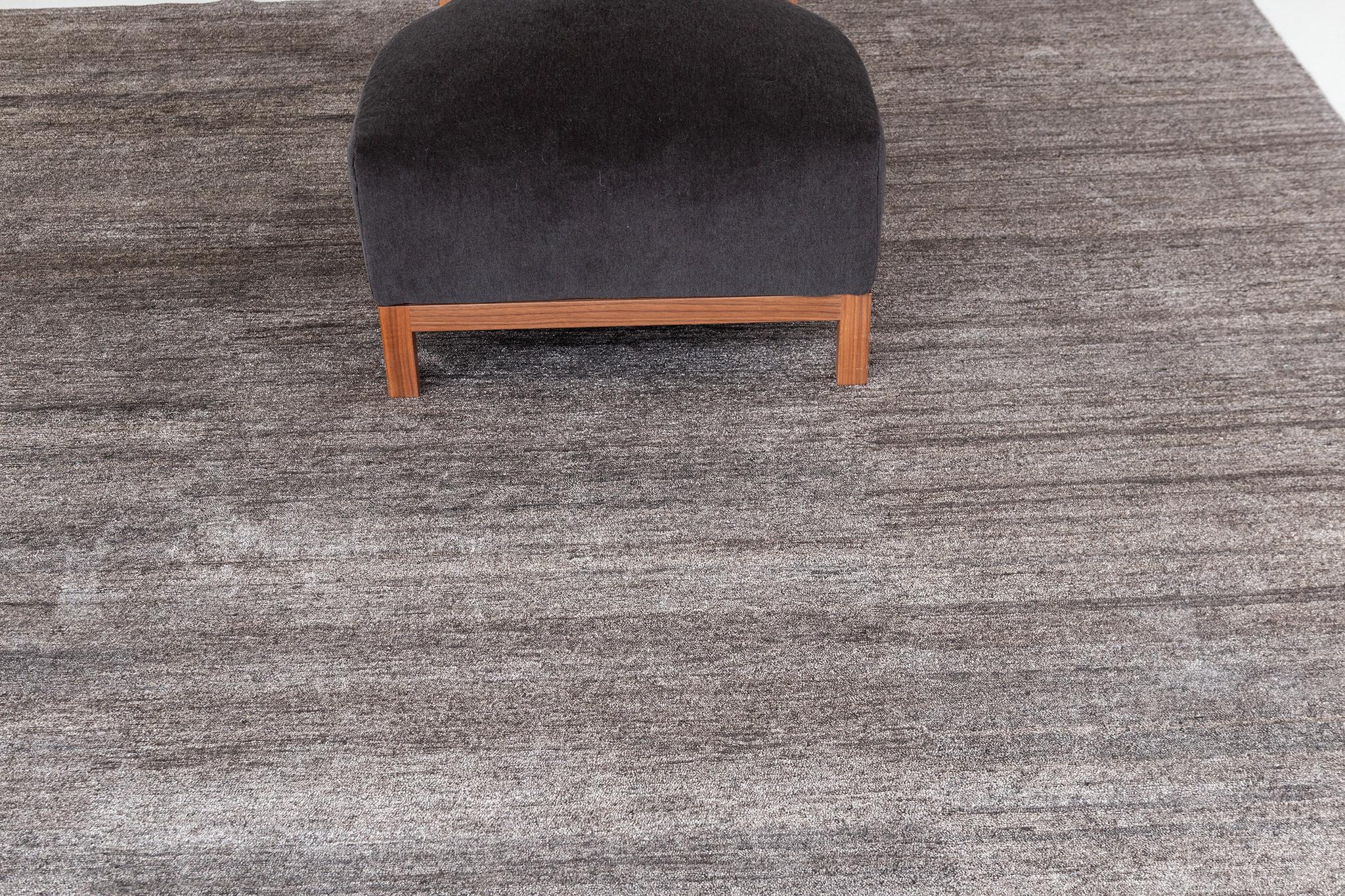 Dara' is a solid bamboo silk rug in stunning charcoal tones. Its simplicity does not take away from the rug's luxurious quality and beautiful sheen. Dara is a splendid rug for any design space.

Rug Number
25939
Size
8' 2