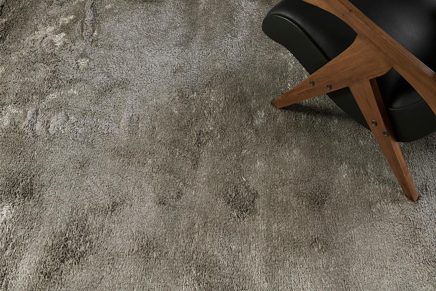 Effortless elegance meets versatility in this Solid Design Viscose Rug. Rendered in the most calming shade of gray, this plush rug called Lusso' gives you the lightweight vibe to the room which makes it most suitable to minimalist interiors. A