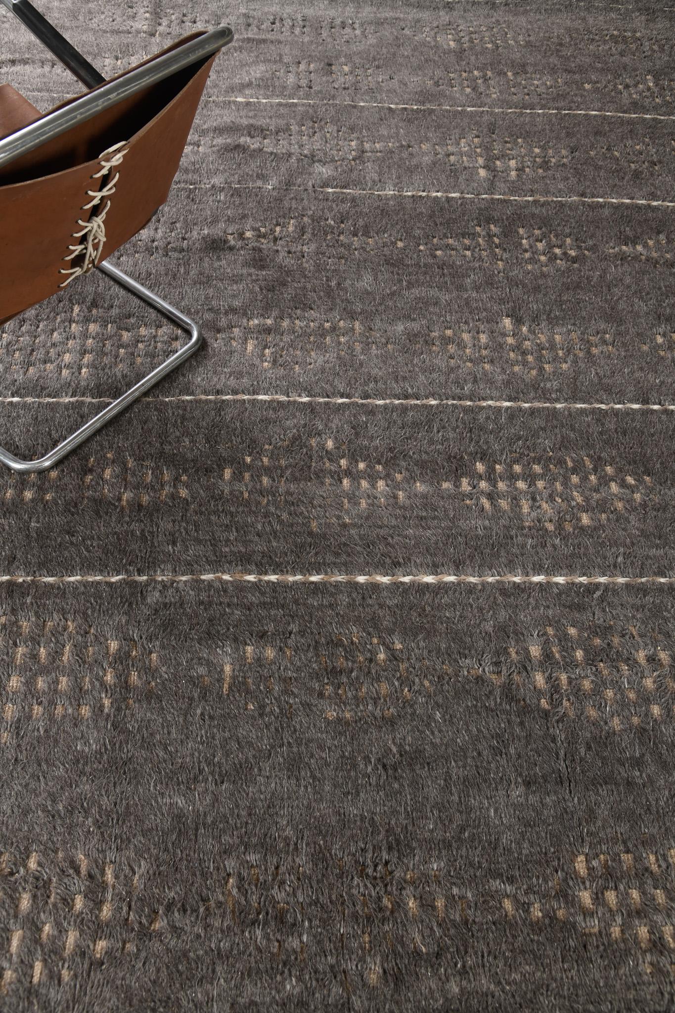 Spoonbill is an elegant wool that features a dark ash gray and embossed contemporary design that gives your interior a dashing allure. The simplicity of this masterpiece renders your creativity in every color scheme. Sandpiper collection designed in