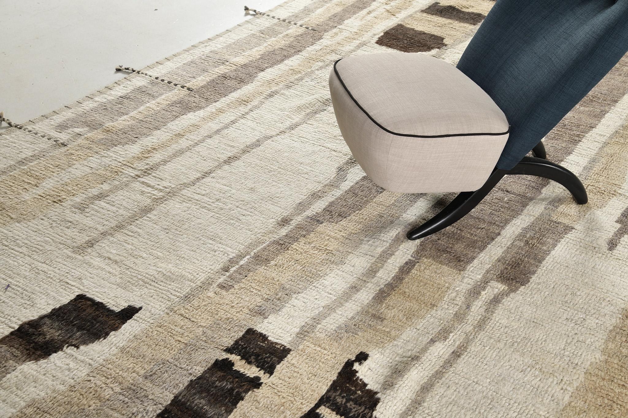 Talassemtane is made of a beautiful wool pile weave in neutral colors and abstract design elements. It's weaving of irregular shapes and patterns is what makes the Atlas collection so unique and sought after. Mehraban's Atlas collection is noted for