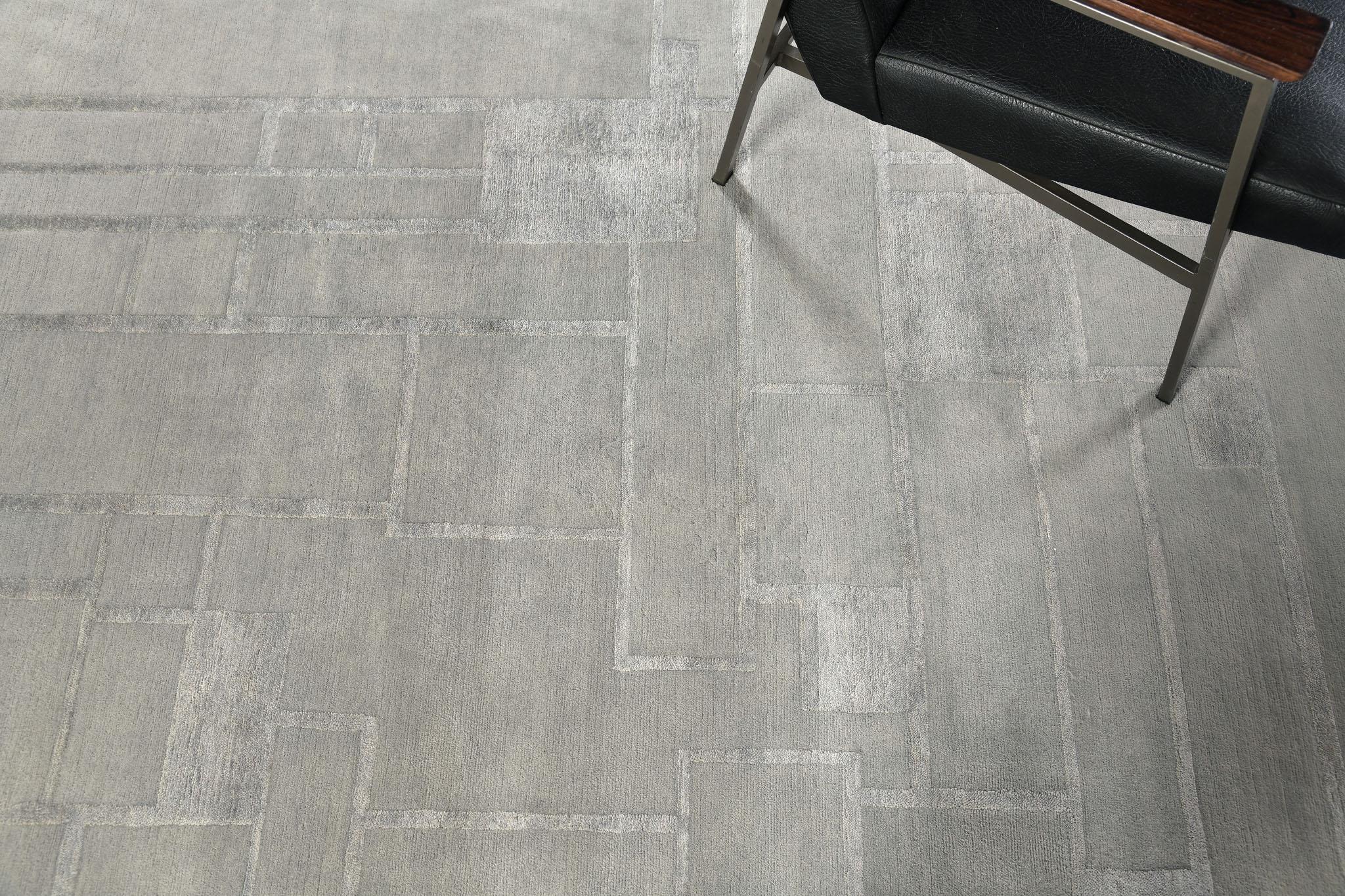 Thassos is elegant wool and silk embossed oversized rug. It is a part of the Design Rhymes Collection which pulls inspiration from different aspects of architecture. It has an identity and creates movement and mood in a space. 'Thassos' has been a