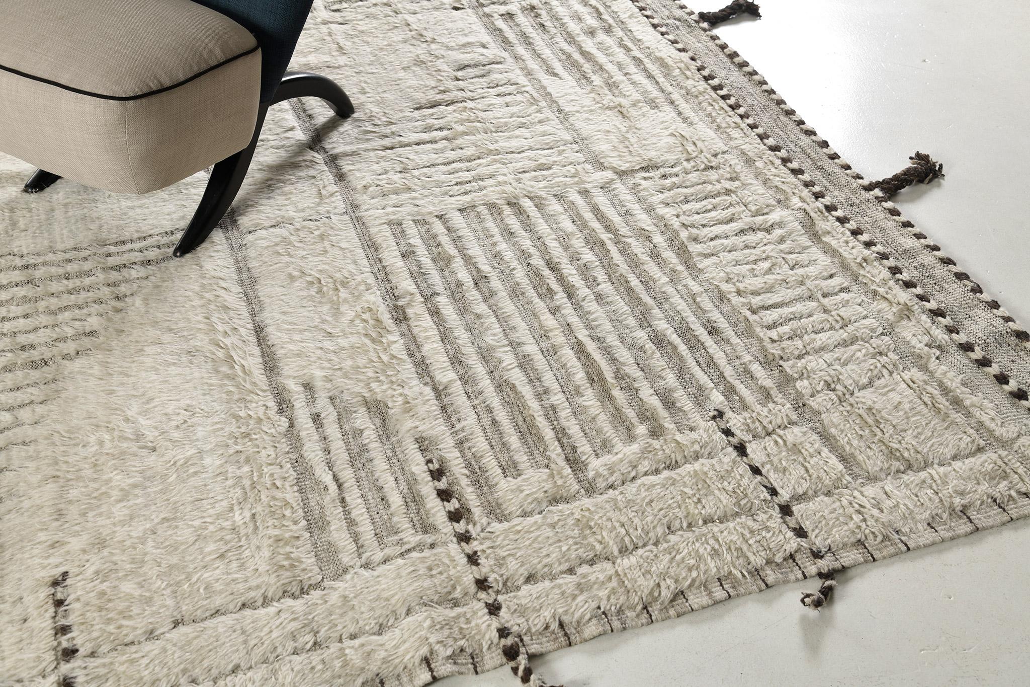 Tisent has a beautiful embossed wool that features various linear strokes. Its warm tone complements your modern contemporary interior and will definitely fascinate the eyes of your guests. This rug plays with textures, linework, and simplicity