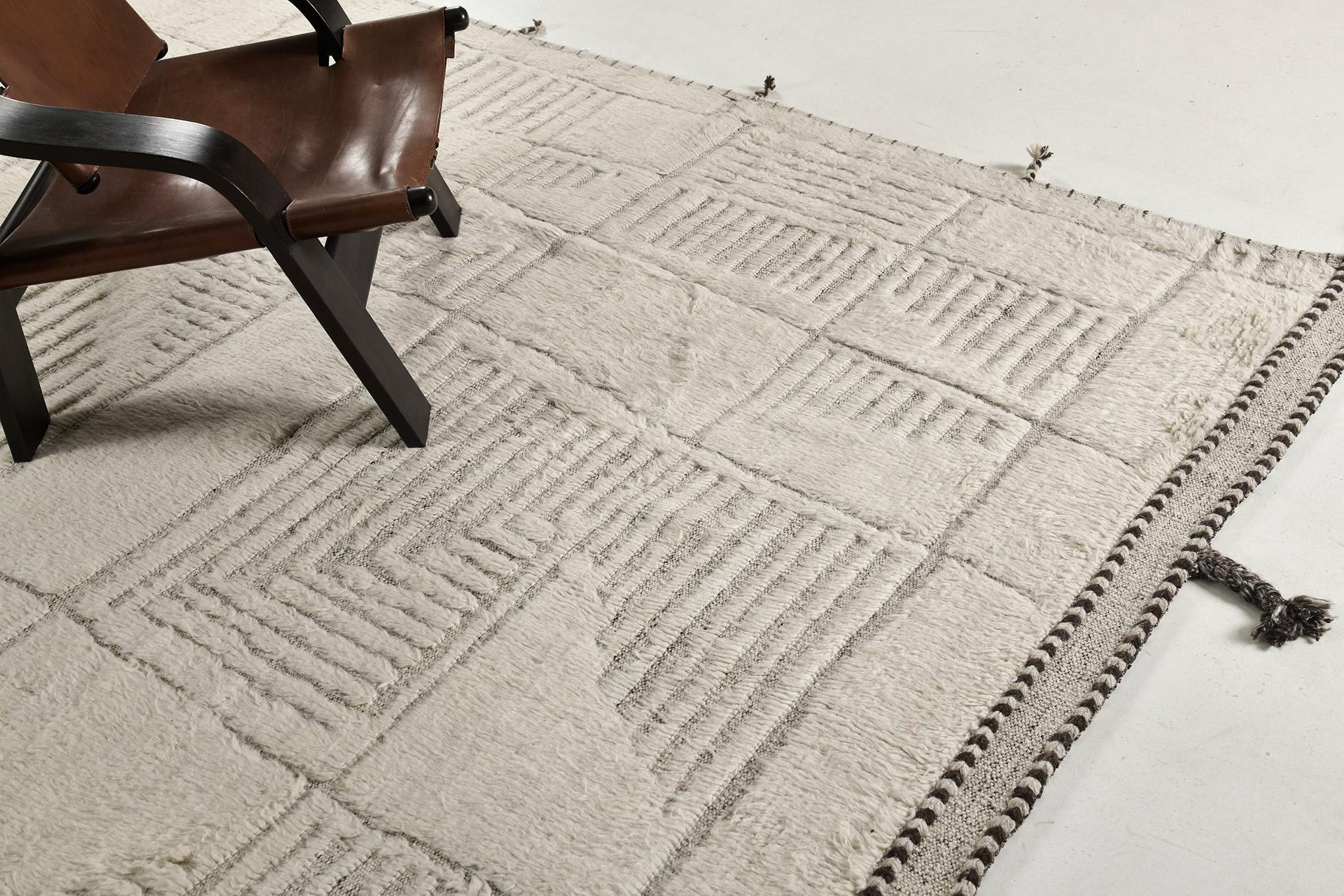 Tisent is beautiful embossed wool that features different linear strokes. Its neutral tone will complement your modern contemporary interior and will soothe the eyes of your guests. This rug plays with textures, linework, and simplicity which makes