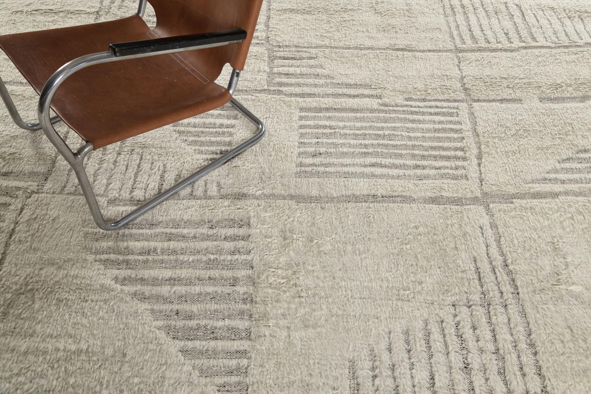 Tisent is beautiful embossed wool that features different linear strokes. Its neutral tone will complement your modern contemporary interior and will soothe the eyes of your guests. This rug plays with textures, linework, and simplicity which makes