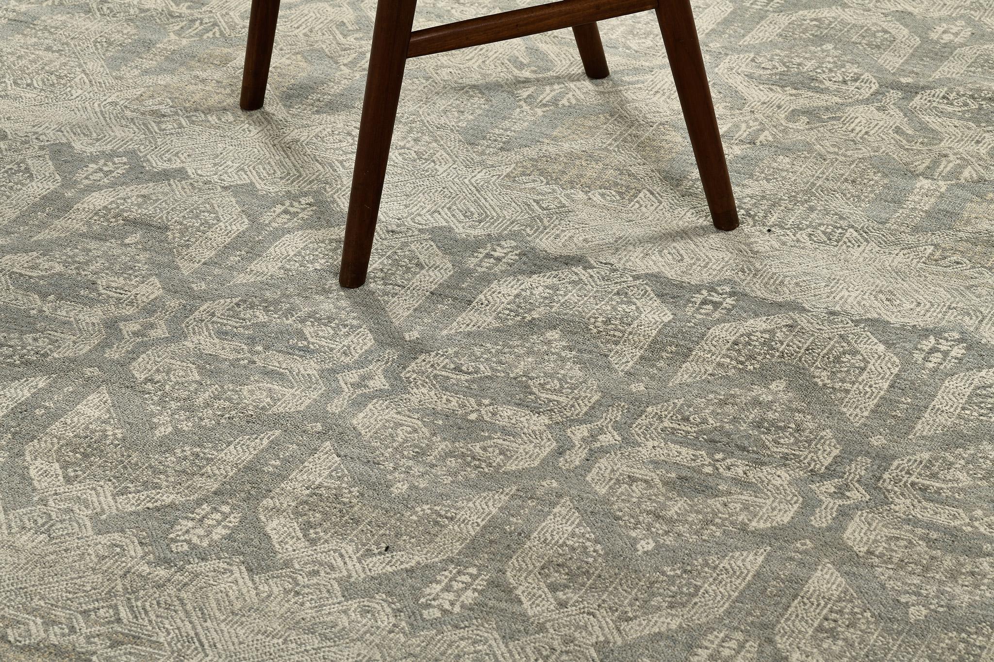 This gray Transitional Design rug is a modern take on Mehraban's classical and iconic Allure Collection. It is an excellent choice for rug collectors due to its utilitarian design function. This magnificent rug would definitely add sense of