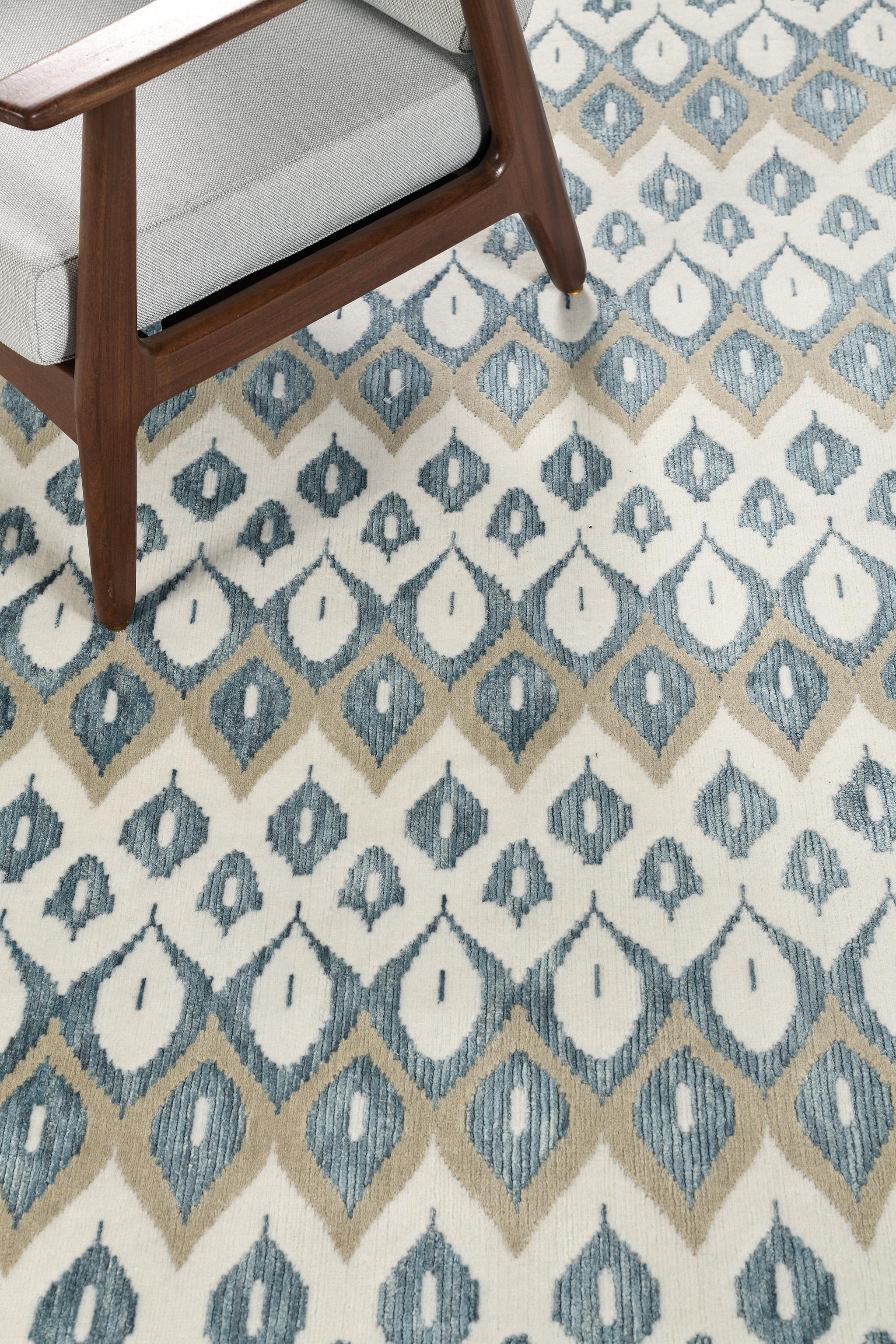 Candela is a wool and silk pile that comes from the home of the infamous Allure Collection. Color schemes are Bluegreen, khaki, and white. These transitional patterns will give an extra edge to its ethereal entrance that will give impressive scenery