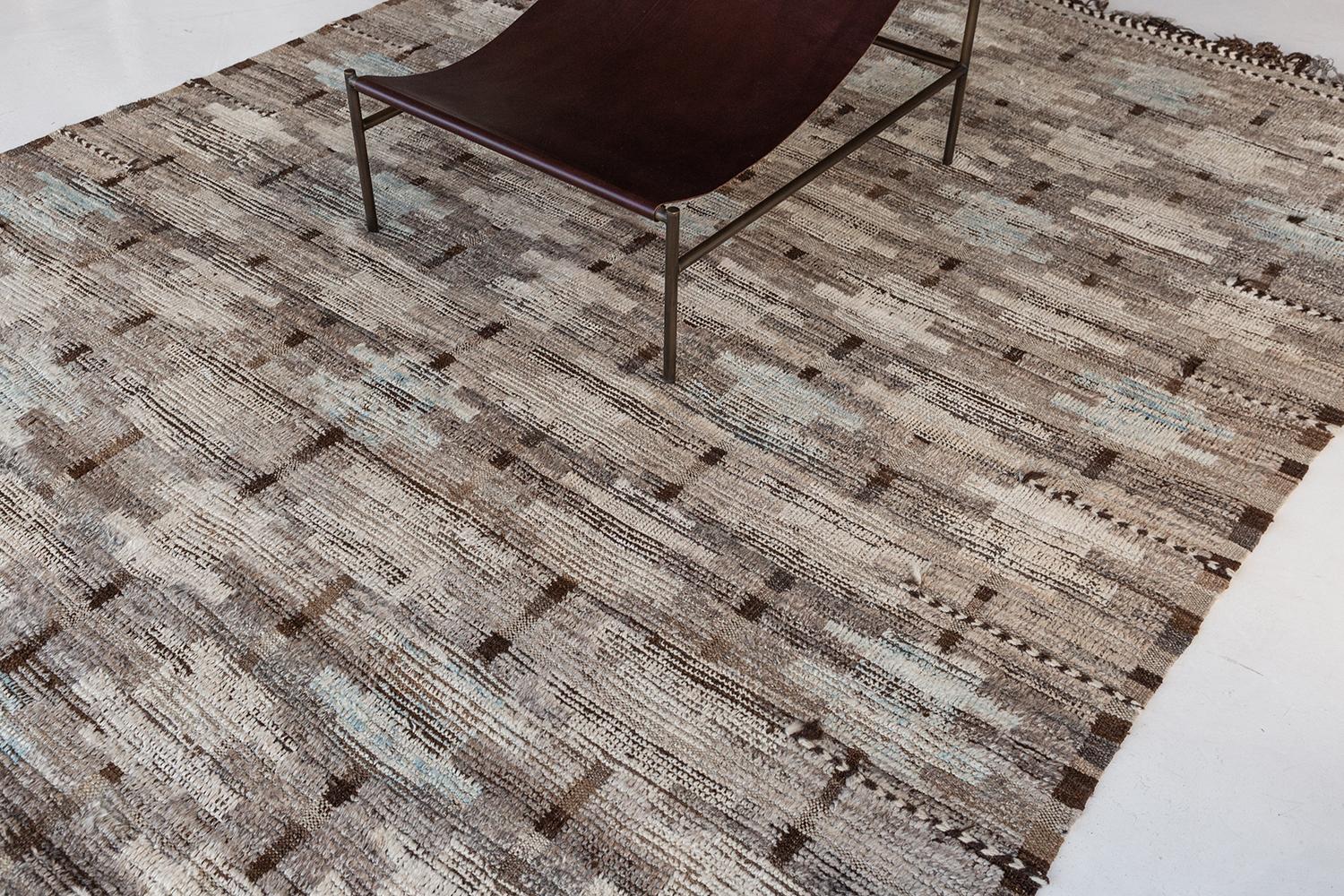 <p>The 'Umea' rug is a handwoven wool piece inspired by vintage Scandinavian design elements and recreated for the modern design world. The rug's shag balance and harmony, hand woven with a neutral flat weave and unique piles of taupe and orange