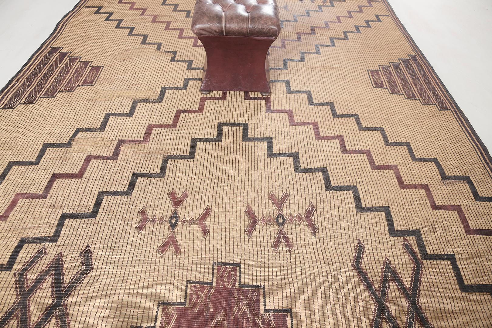 The power to narrate the story of Africans in this mat is very valuable and treasured. This remarkable Tuareg Mat features geometrical motifs and consists of spider, frog, and eye Berber symbols. A masterpiece that your guests will appreciate and