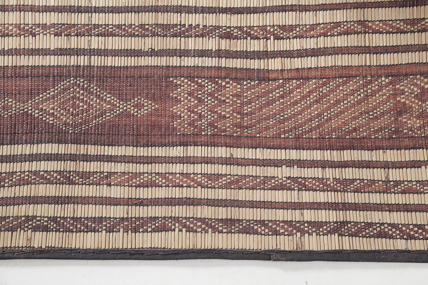 One of the finest mats in our collection has come to enhance your designed spaces. Elegant diamonds and Berber symbols are featured and highlighted on this gorgeous mat. With its strong details that are handwoven in reed and leather, it will be