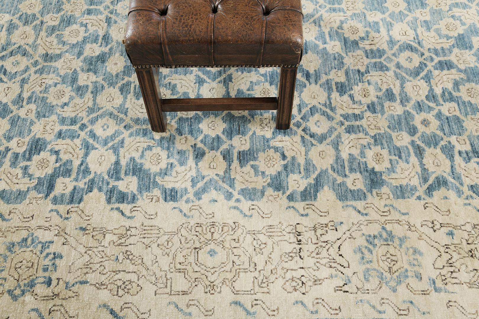 Behold and grab a glance at the charm of the Persian Malayer from our sought-after Traditional Recreation collection. Majestic neutral tones feature the outline details of Persian blooming elements of daisies and carnations in a blue field. Elegant