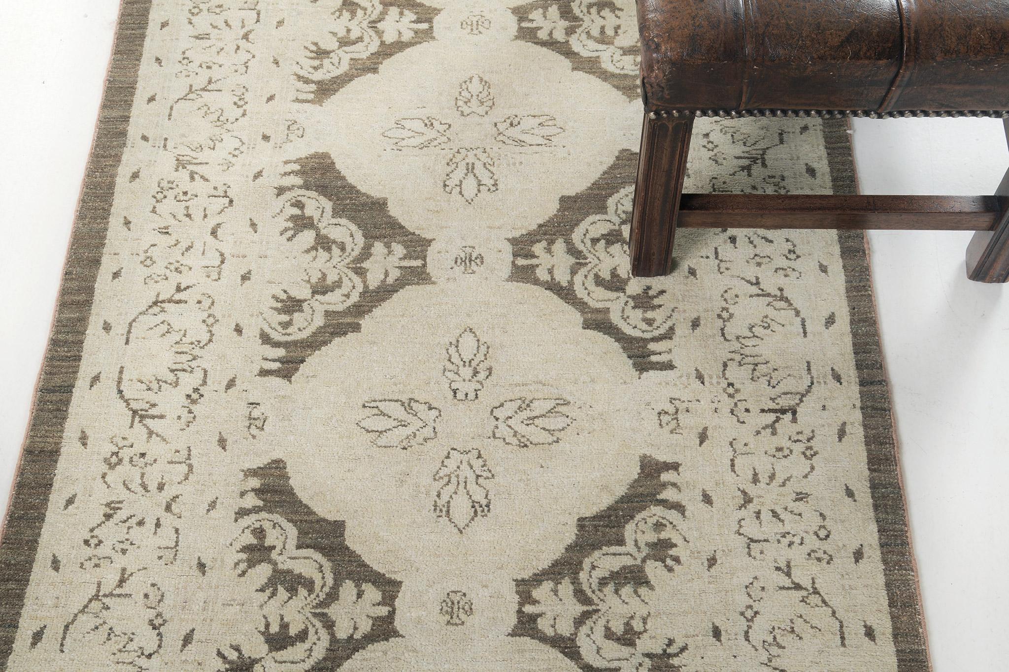 An astounding revival of Arts and Crafts Style runner that features the elegant umber brown. The symmetrical pattern over a panel of the diamonds in the middle is fabricated gracefully in a neutral scheme. Fancy embellishments are formed flawlessly