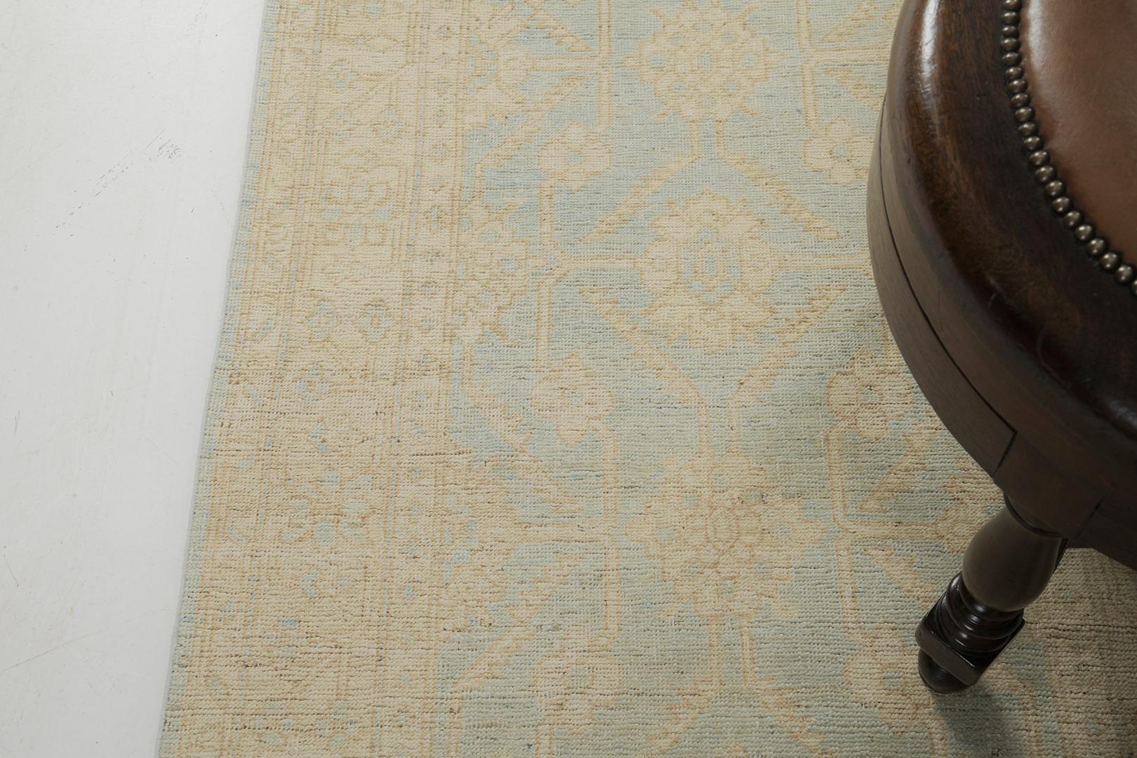 Featuring a revival of the Khotan Vintage-styled runner with 3 layers of borders. This rug works to bring together various ornamentation. Florid elements and medallions are perfectly established with a wash tone of camel, coffee, and blue hues.