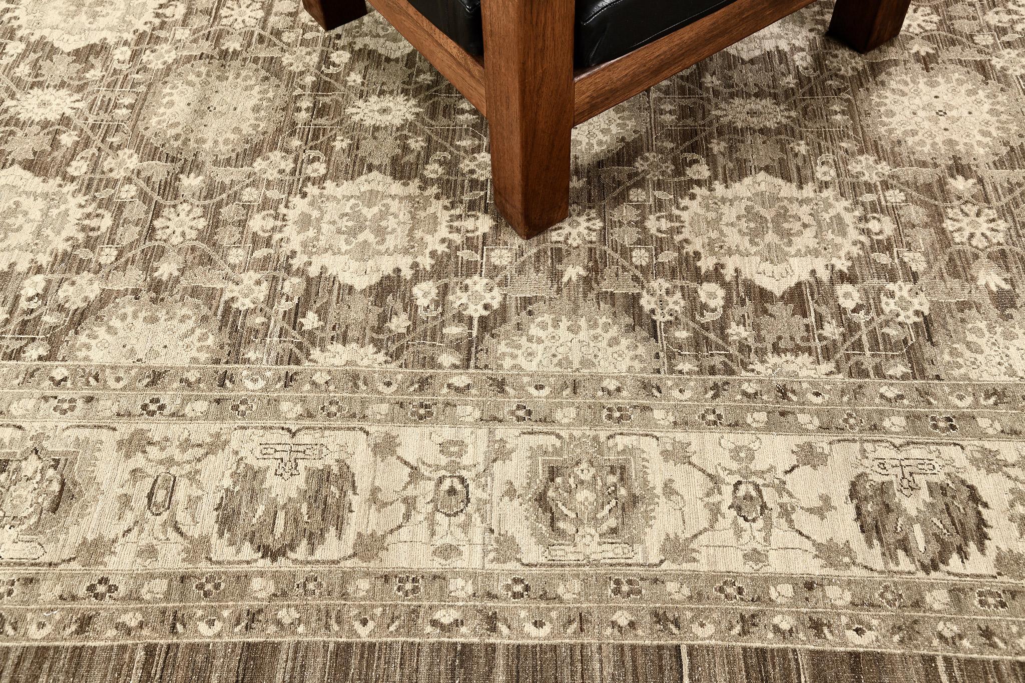 This enchanting revival of the Mahal rug has created an impressive pattern. Featuring the well-coordinated neutral tones and a tinted palette of tans, this elegant rug is composed of enchanting florid elements forming different grandiose medallions