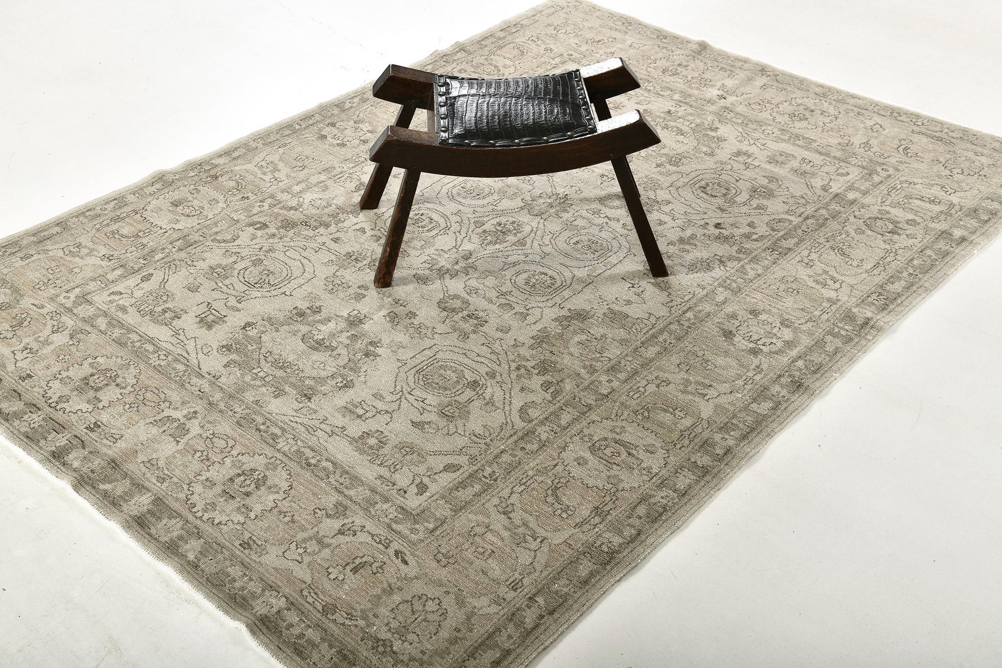 This exquisite Mahal Mostofi revival rug encompassing the patterns that express the sophistication and colors that can be seen. This results in a wonderfully balanced look and feel. The scaled and neutral-colored tone will make a magnificent