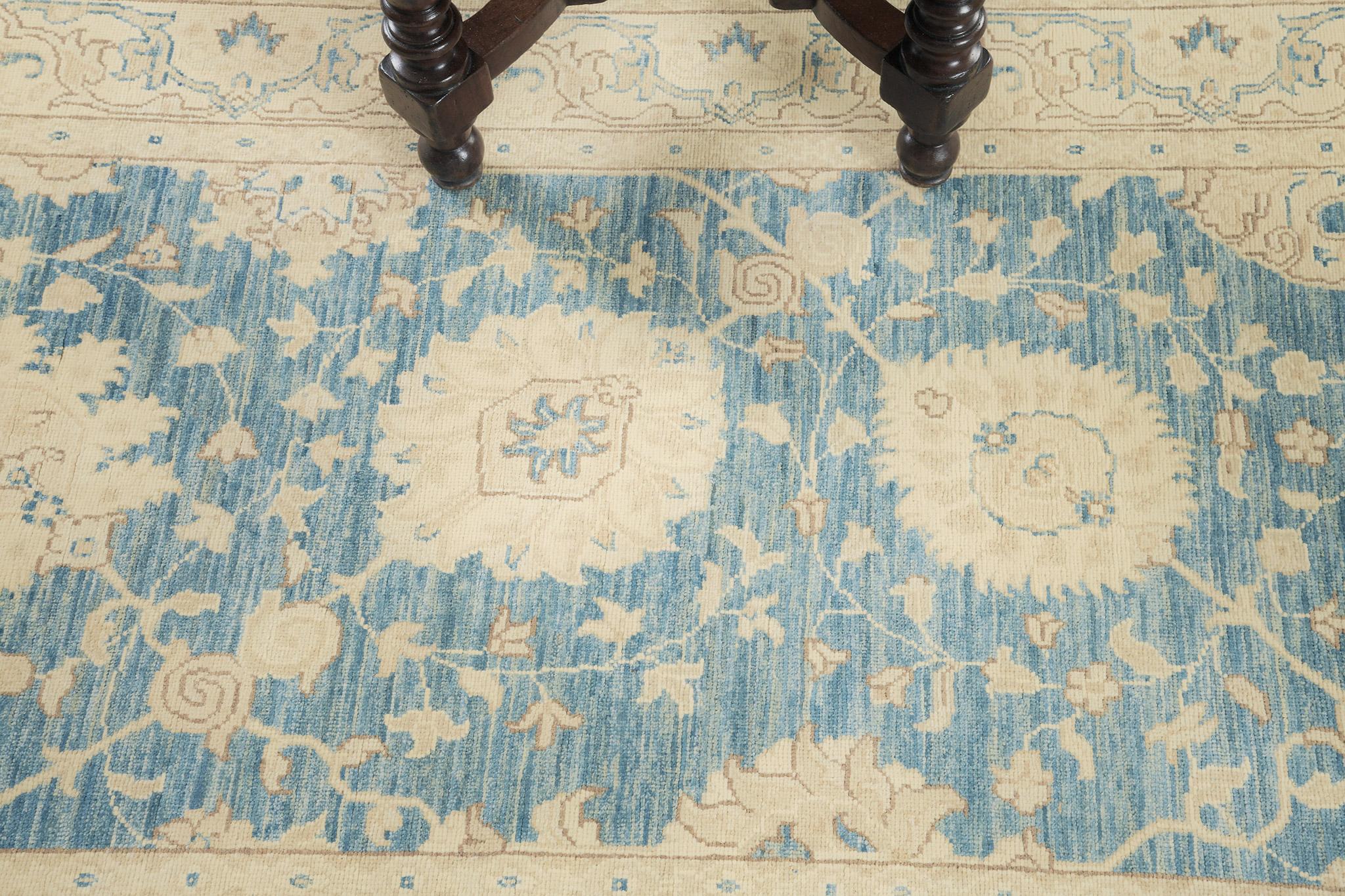 This sophisticated vintage-styled Tabriz rug from our Rapture Collection has its essence to transform your room full of comfortability and ambiance. Its scrolling vinery symmetry reflects intricacy and elegance in the cool-toned scheme. A must-have