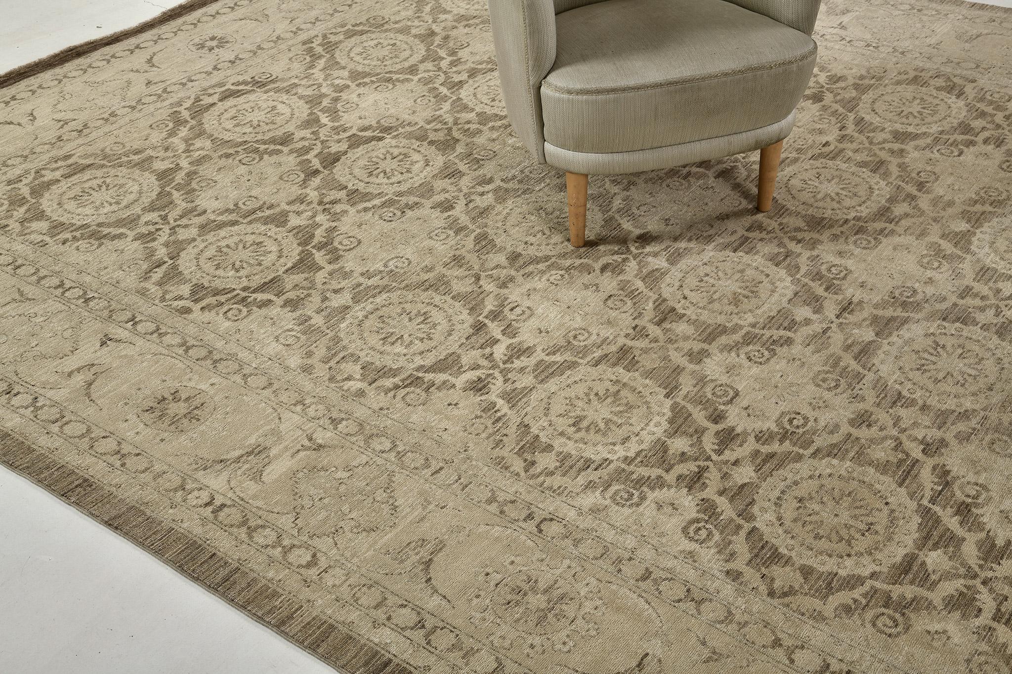 A sophisticated revival of Tabriz rug in Rapture Collection that elegantly establishes superior intricacy through an allover pattern of ornate emblems connected by graceful vines. Flanked by inner and outer floral guard bands, this classy rug is in