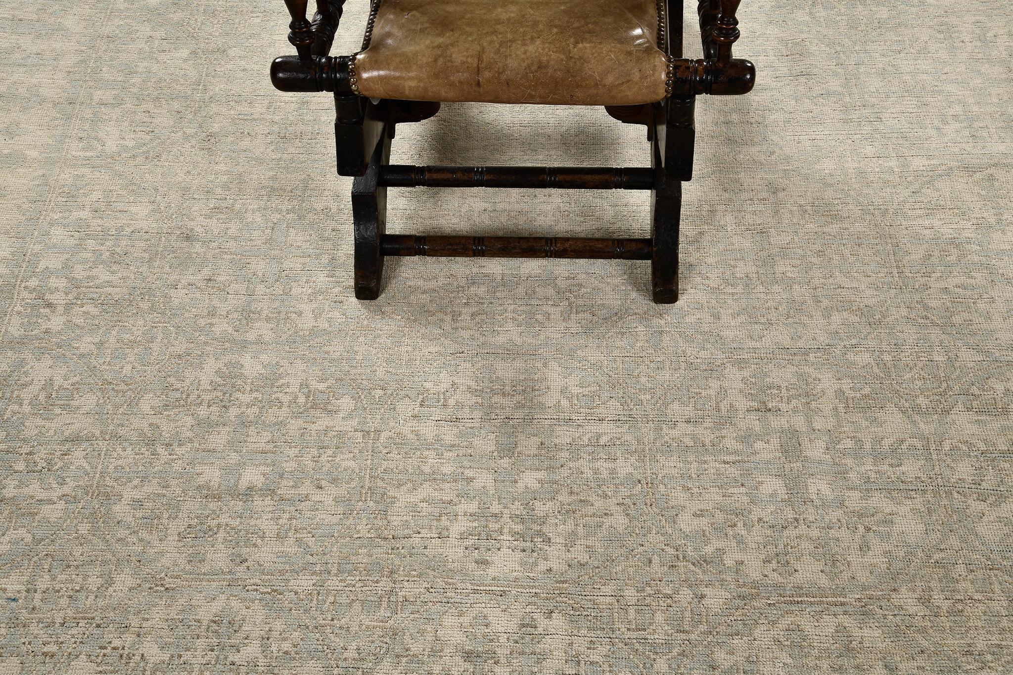 A vintage style revival rug in Safira Collection featuring the muted tones of sand and clay. All-over pattern of blossoming ornate motifs are enclosed by borders of serrated leaves that blend together in harmony. A truly perfect match to your dream