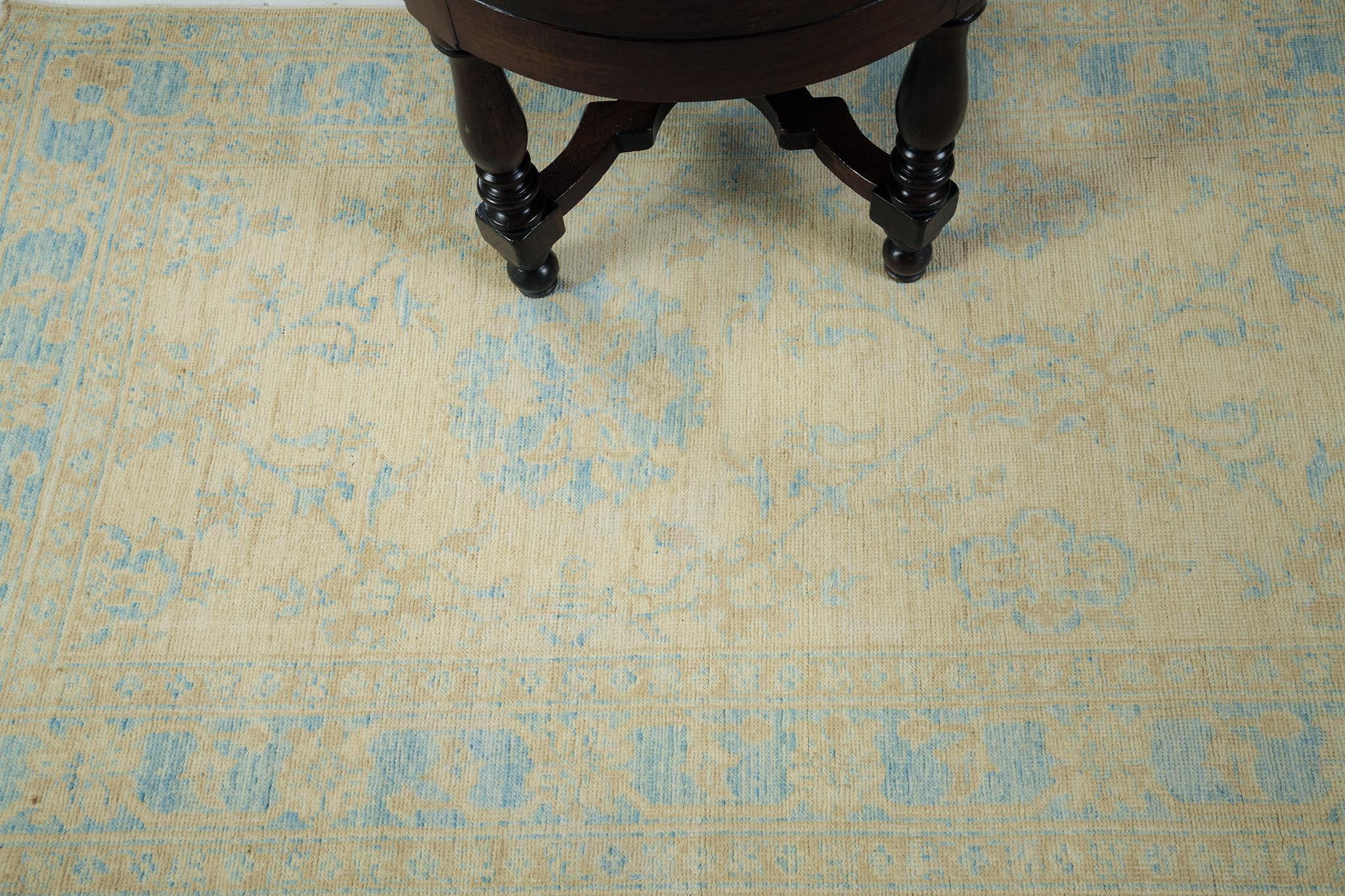 A series of symbolic grandiose ornaments are featured through the cerulean blue vines to show sophistication in the khaki field. The border is elegantly twirled to form a graceful Sultanabad Runner in vintage style. Traditional and modern interiors