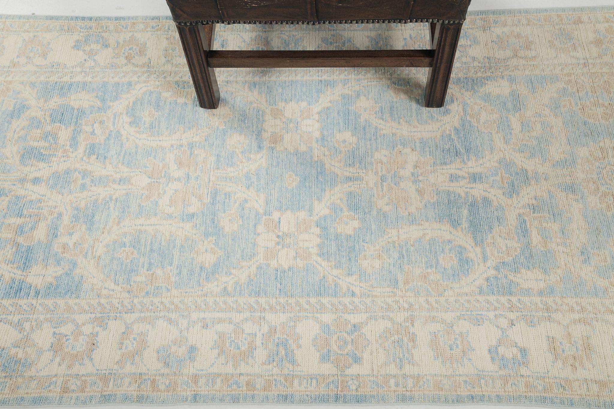 This will be an impeccable choice to style your home with our Sultanabad Rug revival. Perfect anywhere and in any style you want. Impressive vines are connected with various embellishments and symbolic elements in oatmeal, cream, and gold accents in