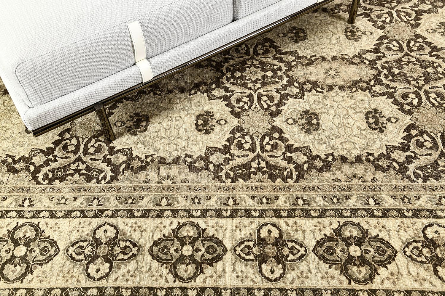 A stunning Tabriz revival rug that is made from hand-spun wool and natural dye. Featuring the astonishing neutral colour scheme that blends over the majestic allover botanical composition. A masterpiece that will truly add character to one’s