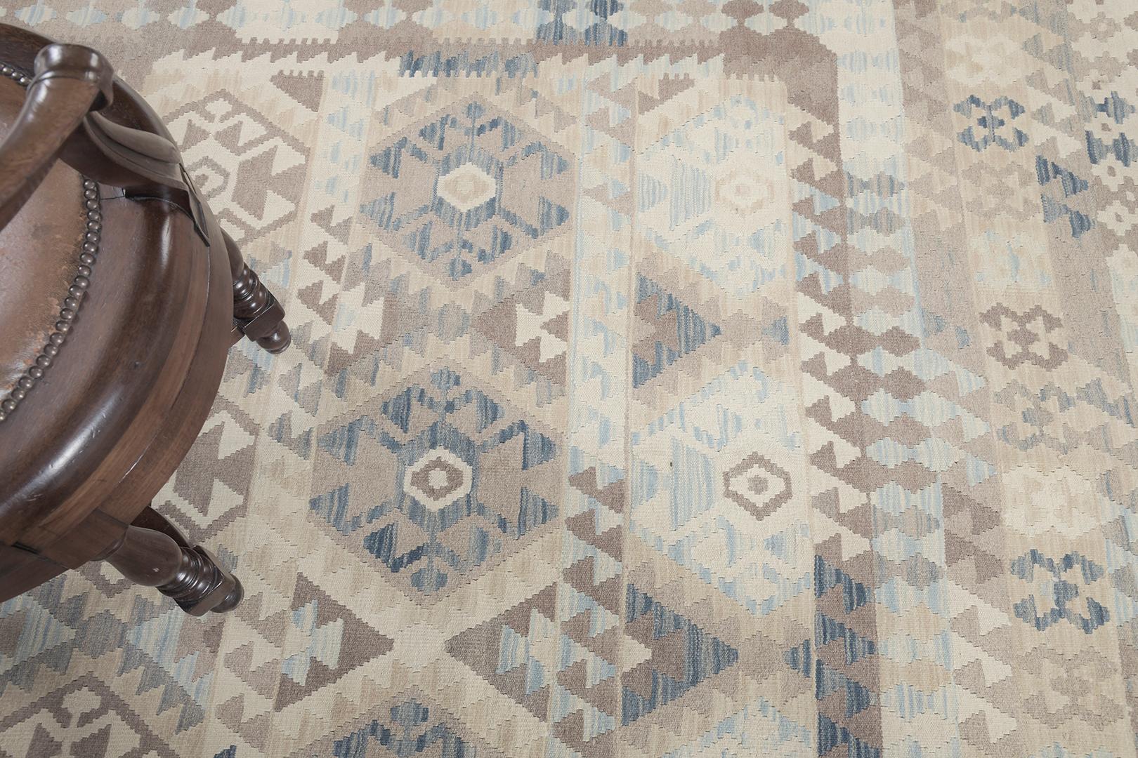 A gorgeous vintage-style Tribal flat weave banded with geometric elements. The muted earth-hued alternating squares create a simple yet interesting design for a wide variety of interiors. Its technique and creativity leave a powerful impact on every