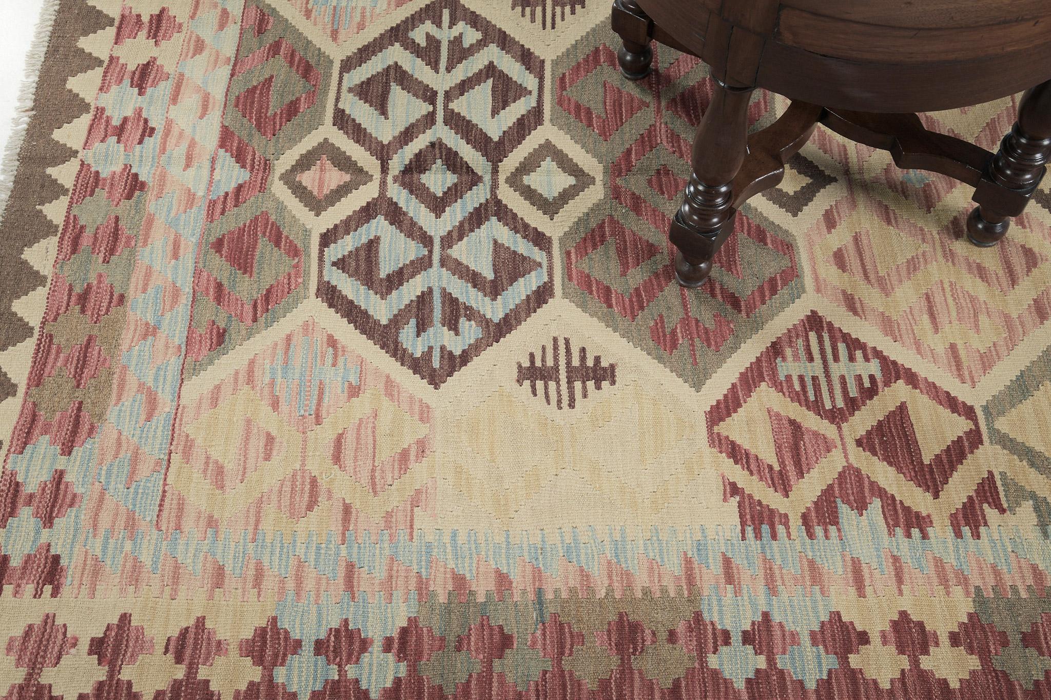 Scorpion patterns are featured in this stunning masterpiece. Yellow, red, brown, and some variegated tones of blue and white, are perfectly woven in this Kilim. An oversized rug that can fill in your spaces.

Rug Number
24953
Size
5' 7