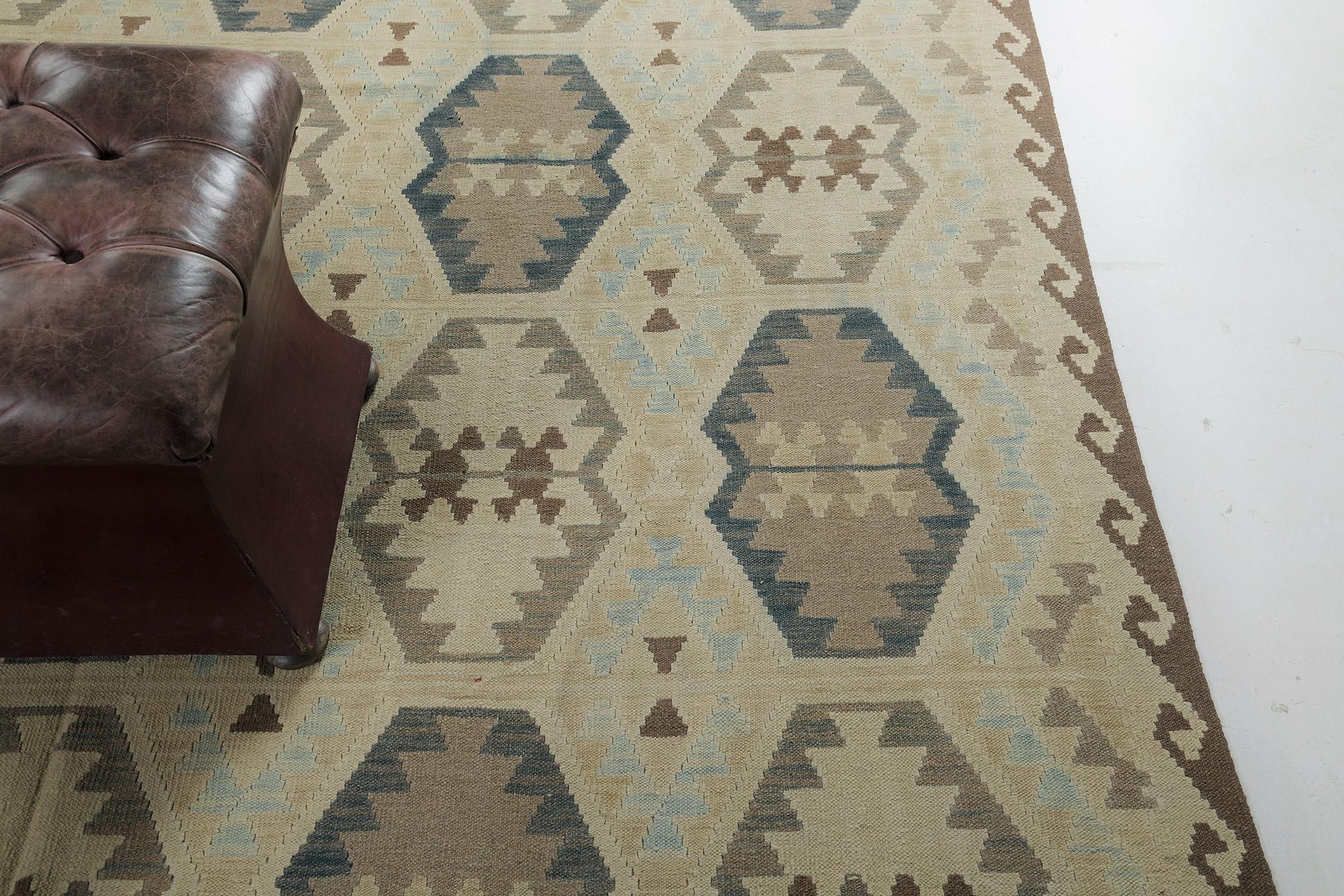 A combination of neutral to cool tones is featured in this Tribal flat-weave kilim in vintage style. With its simplicity, it is easy to match every interior you want to decorate. A perfect centerpiece that is versatile and flexible in every
