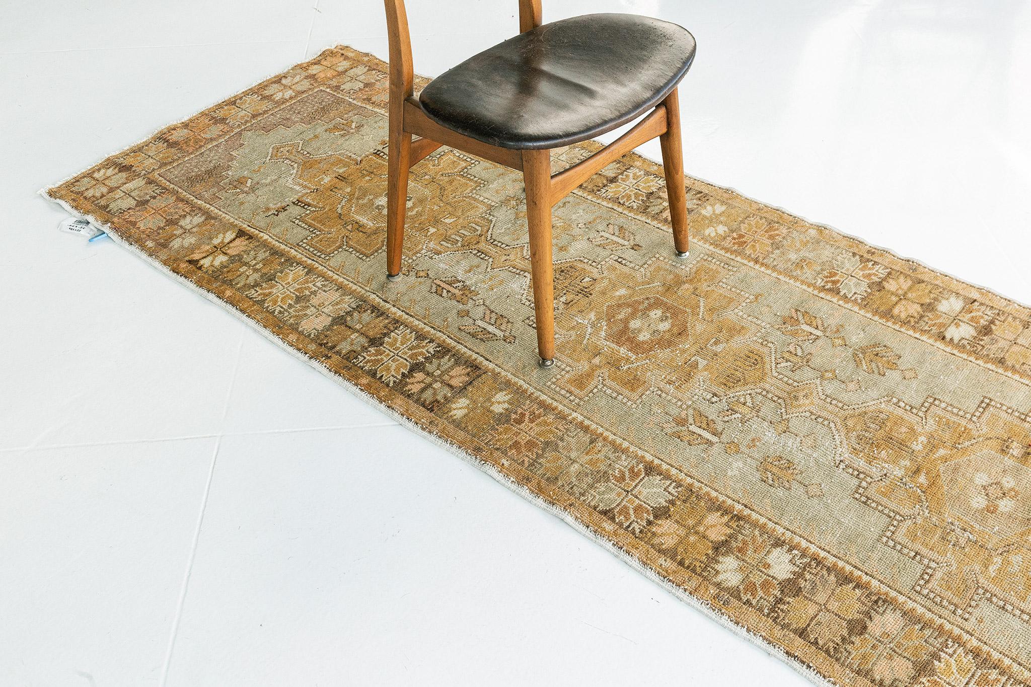 Soft elegance and warm pastel colors bring coordination to this Vintage Turkish Anatolian runner. It embodies lavish Anatolian style with series of medallions composed botanical elements dancing on the abrashed field. A magnificent rug of timeless