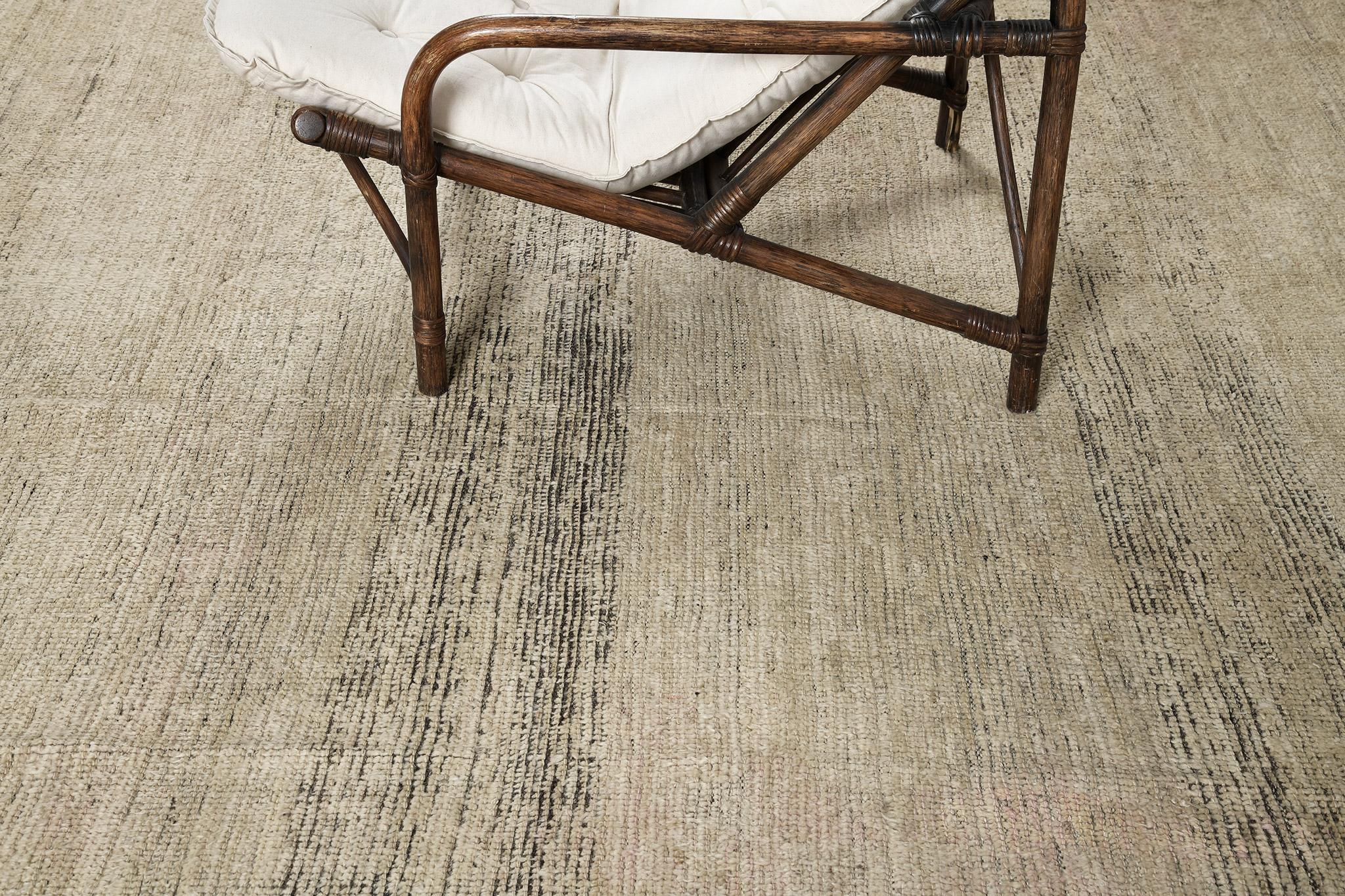 A magnificent display of work of art, Wadu’ features a natural colour scheme of sand and hints of charcoal. Visible abrash magnifies the rug's character and leaves an impression that surely a viewer cannot resist. A piece that is a perfect addition