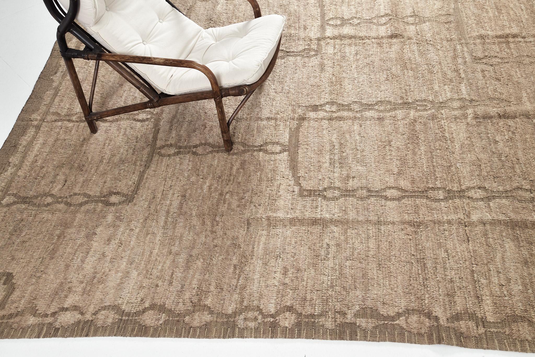 Ziri in Nomad Collection features the soothing earthy toned shades of tan and mocha. Statement motifs that runs along throughout the entirety of this wonderful rug brings out its stunning character. A piece that will surely fit to wide range of