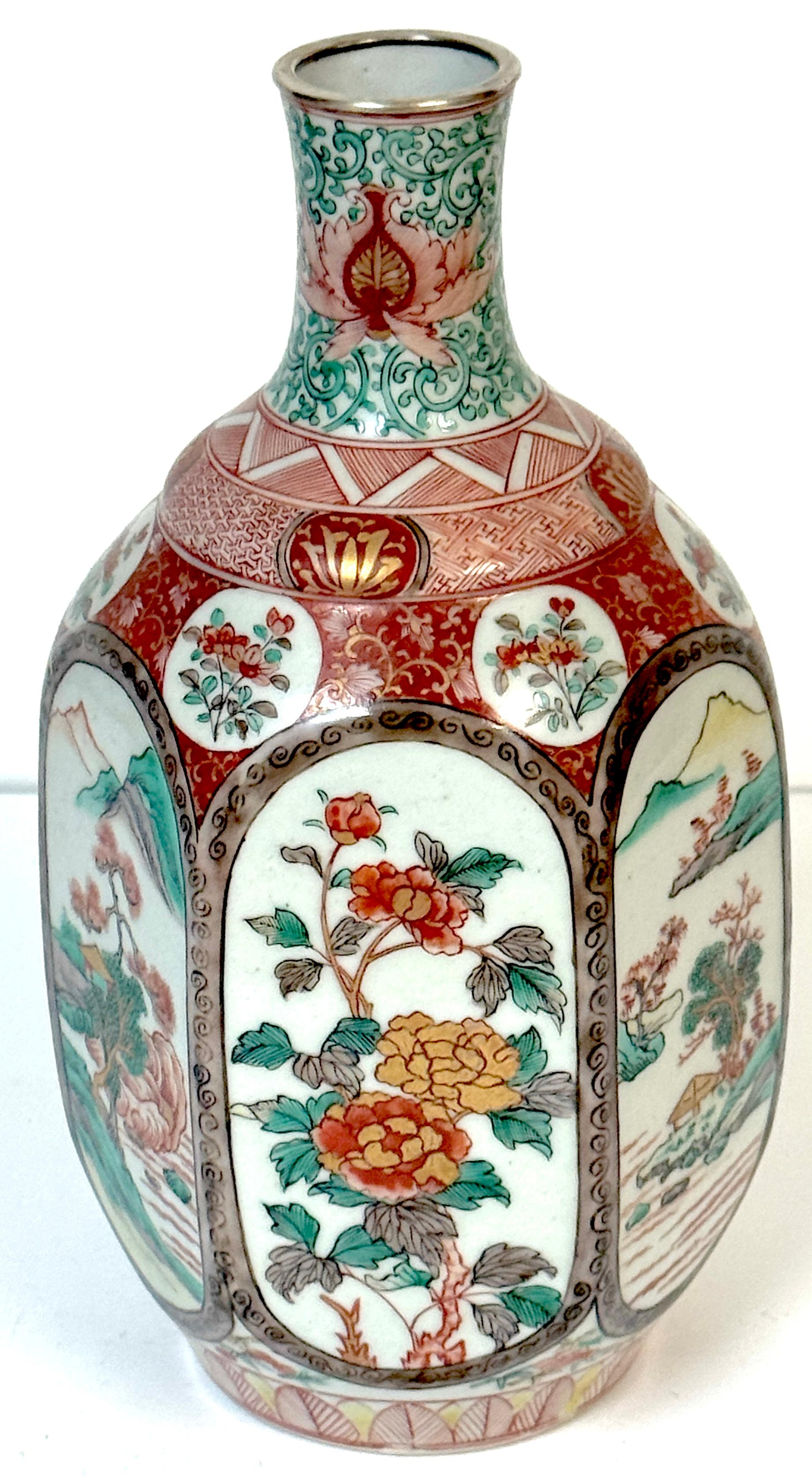 Fukagawa Hexagonal Imari Porcelain Vase with Factory Silver Collar, Meiji Period, circa 1900

An exceptional Meiji-period Japanese porcelain vase attributed to the Fukagawa studio, featuring a refined hexagonal form and a rare factory-applied silver