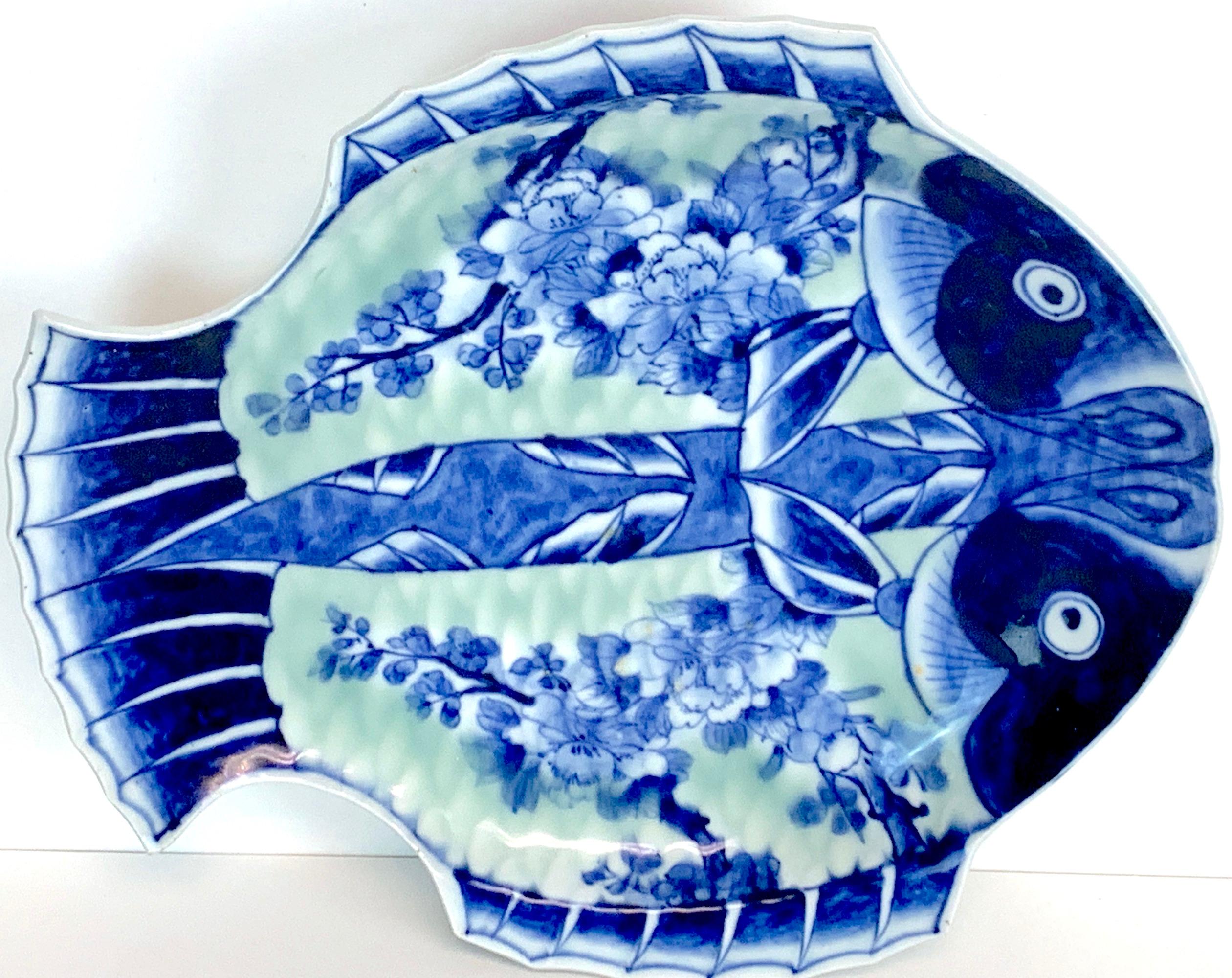 Meiji Imari Celadon Fish Plate, by Fukagawa III
A fine example, well decorated, Marked, circa 1890
This examples measures 11-Inches wide x 9.75-Inches high.
Part of a collection of Eight fine Imari examples, The III is for internal inventory
