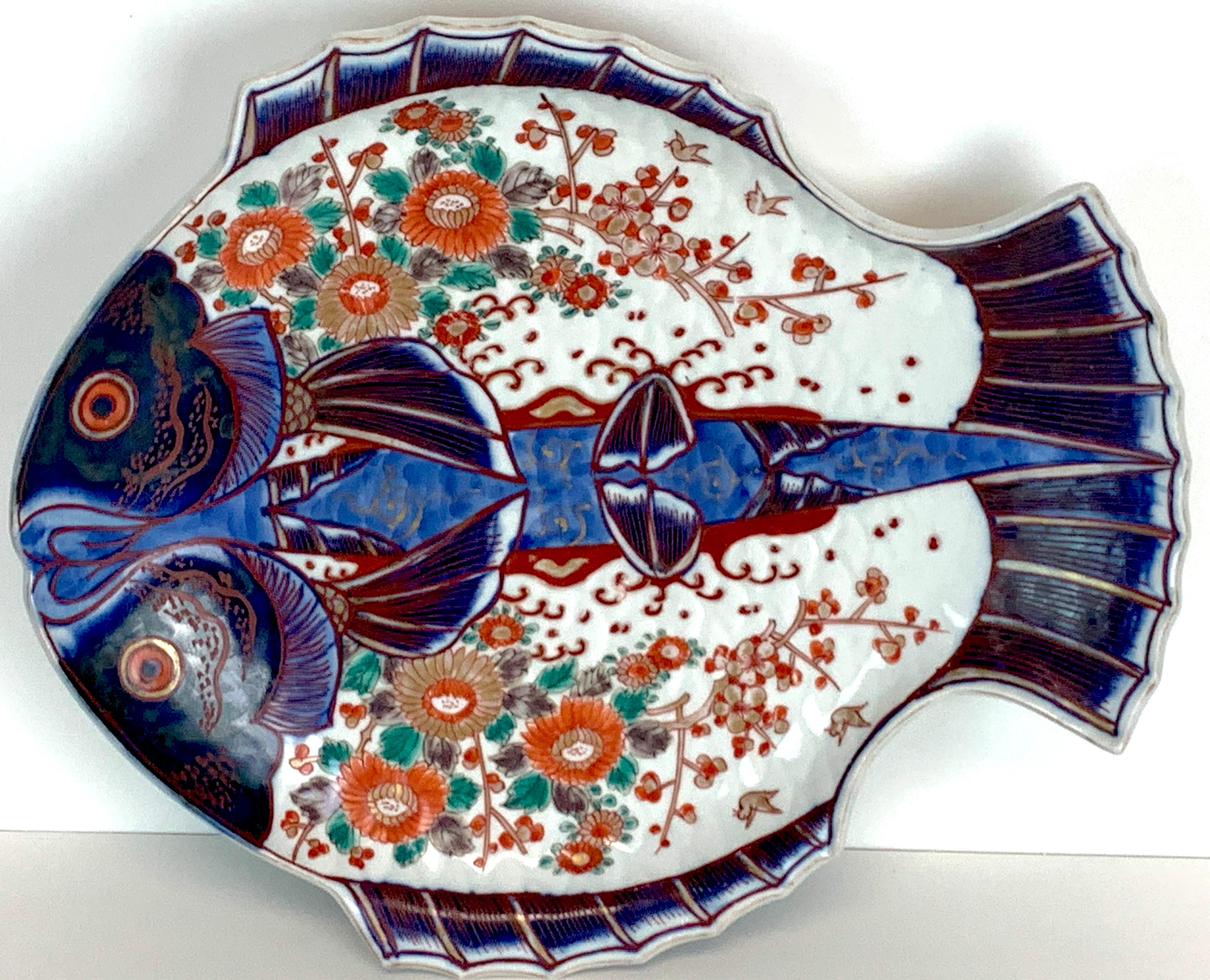 Meiji Imari fish plate, by Fukagawa V
A fine example, well decorated, good size, marked, circa 1890
This examples measures 11.5-inches wide x 9.75-inches high.
Part of a collection of eight fine Imari examples, the V is for internal inventory