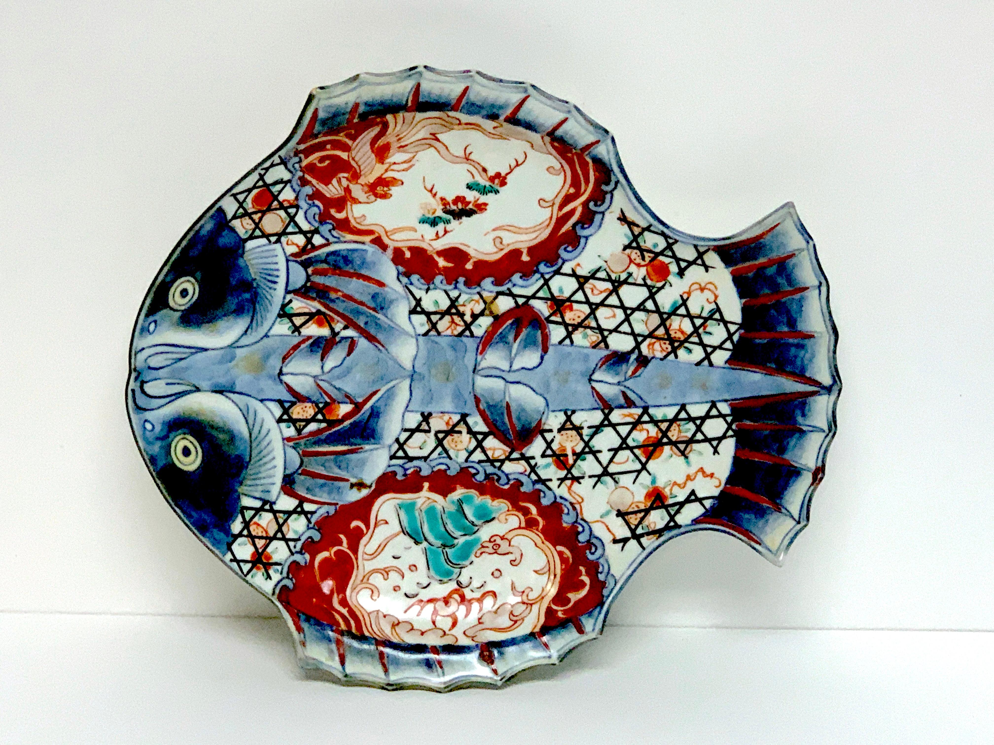 Meiji Imari fish plate I
A fine example, well decorated, unmarked, circa 1890
This examples measures 9-inches wide x 8-inches high.
Part of a collection of eight fine Imari examples, the I is for internal inventory purposes.