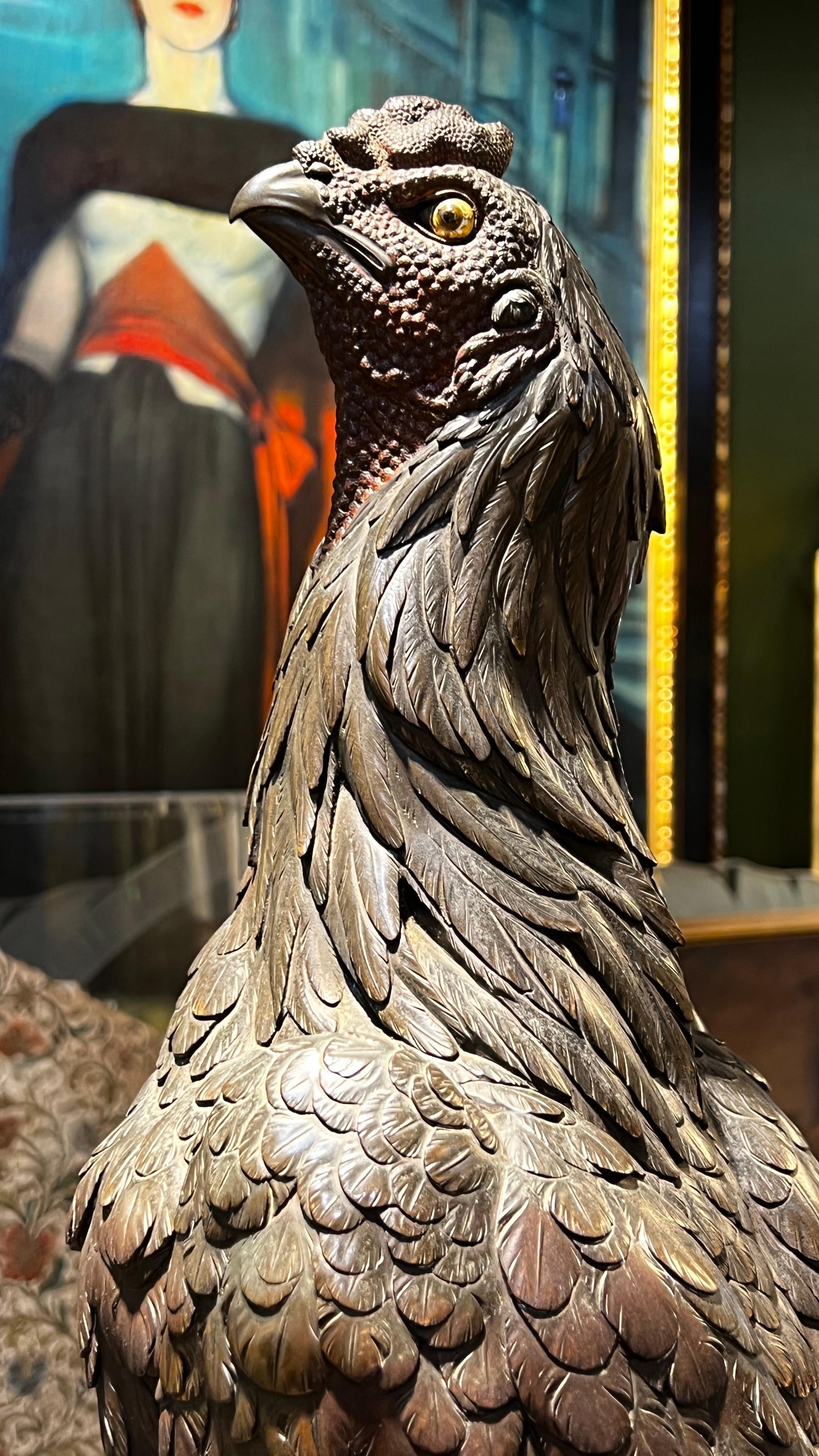 Our magnificent bronze figure of a cockerel (rooster) by Hideyoshi Seizo dates from the late Meiji period. Patinated with the tail feathers finished in shakudo and body feathers in copper and brown shades with gilded patches, with additional traces