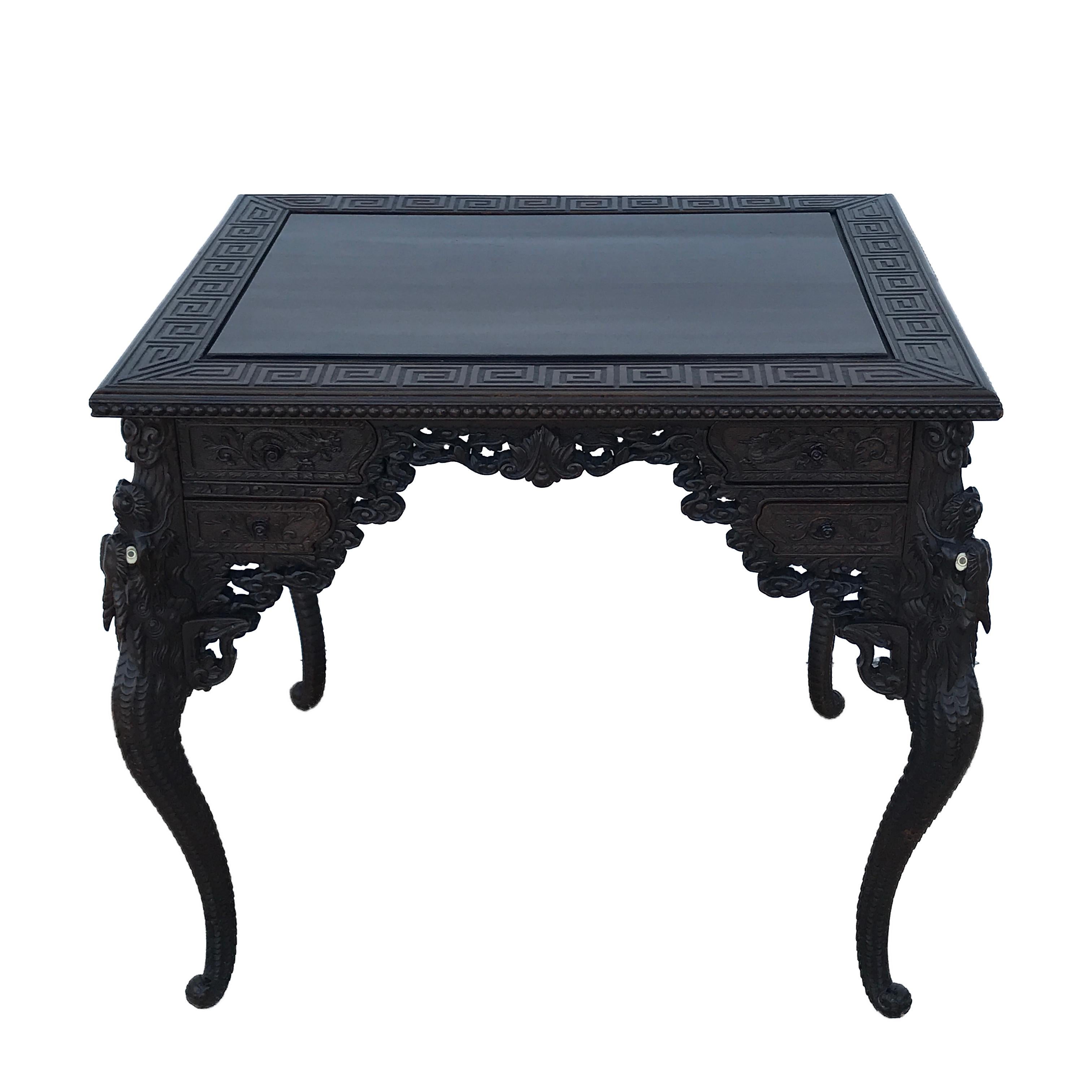 Meiji period Japanese carved dragon motif desk, fitted with numerous drawers on both sides.
 
   