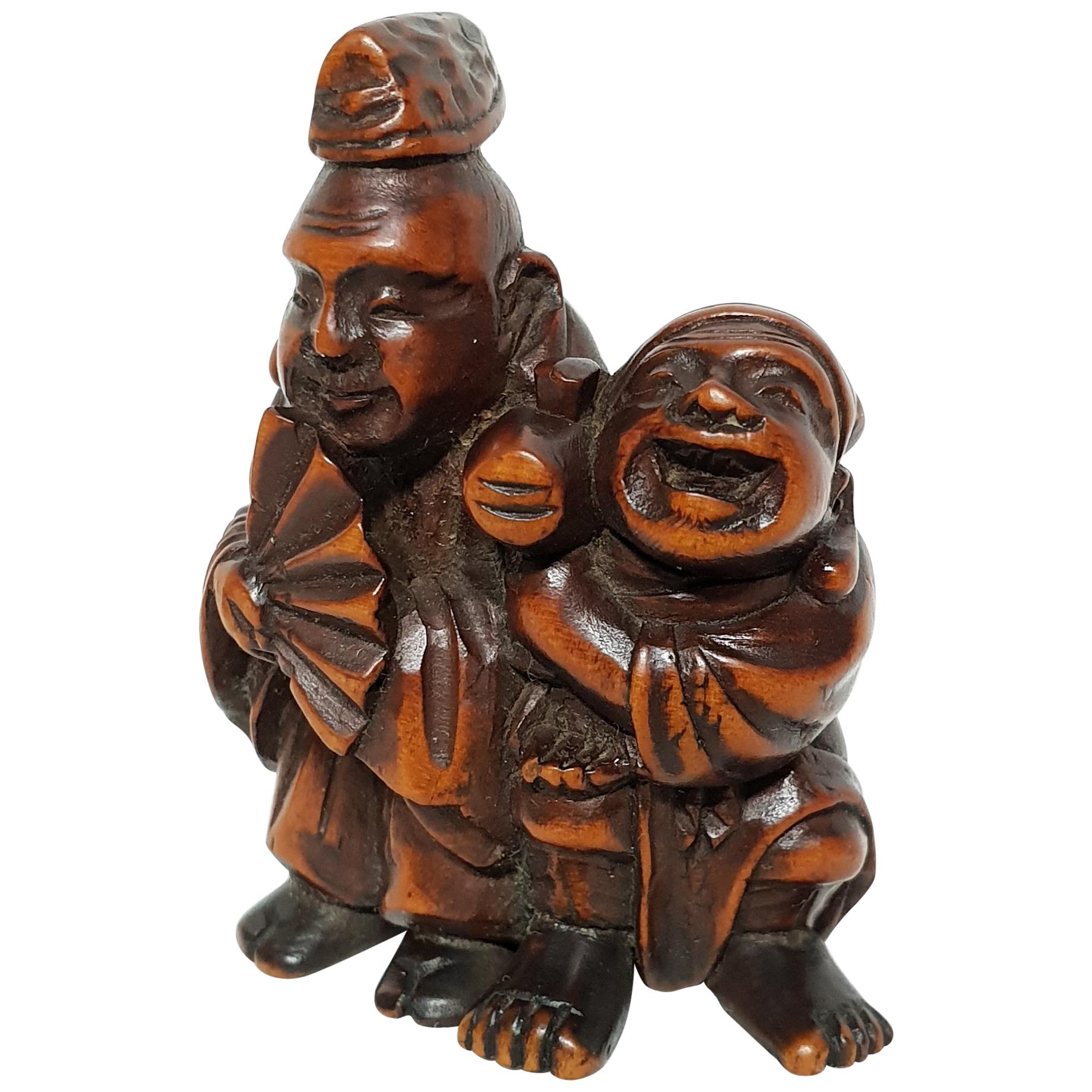 Meiji Period Japanese Two Street Entertainment Netsuke, 1880s