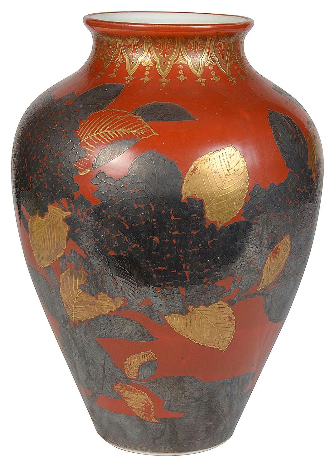 A very decoration and striking Japanese Meiji period (1868-1912) porcelain vase with an overlay lacquer decoration with bronzed and gilded leaves and foliage on an orange ground.
We can convert the vase to a lamp if required.
Signed to the base.
 
