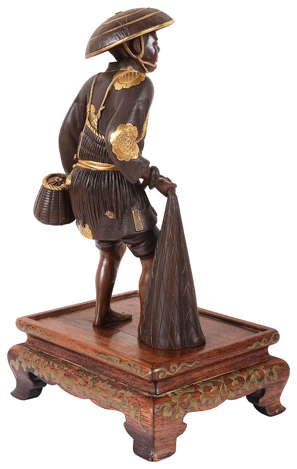 Patinated Meiji Period, Miyao Bronze Figure of a Fisherman For Sale