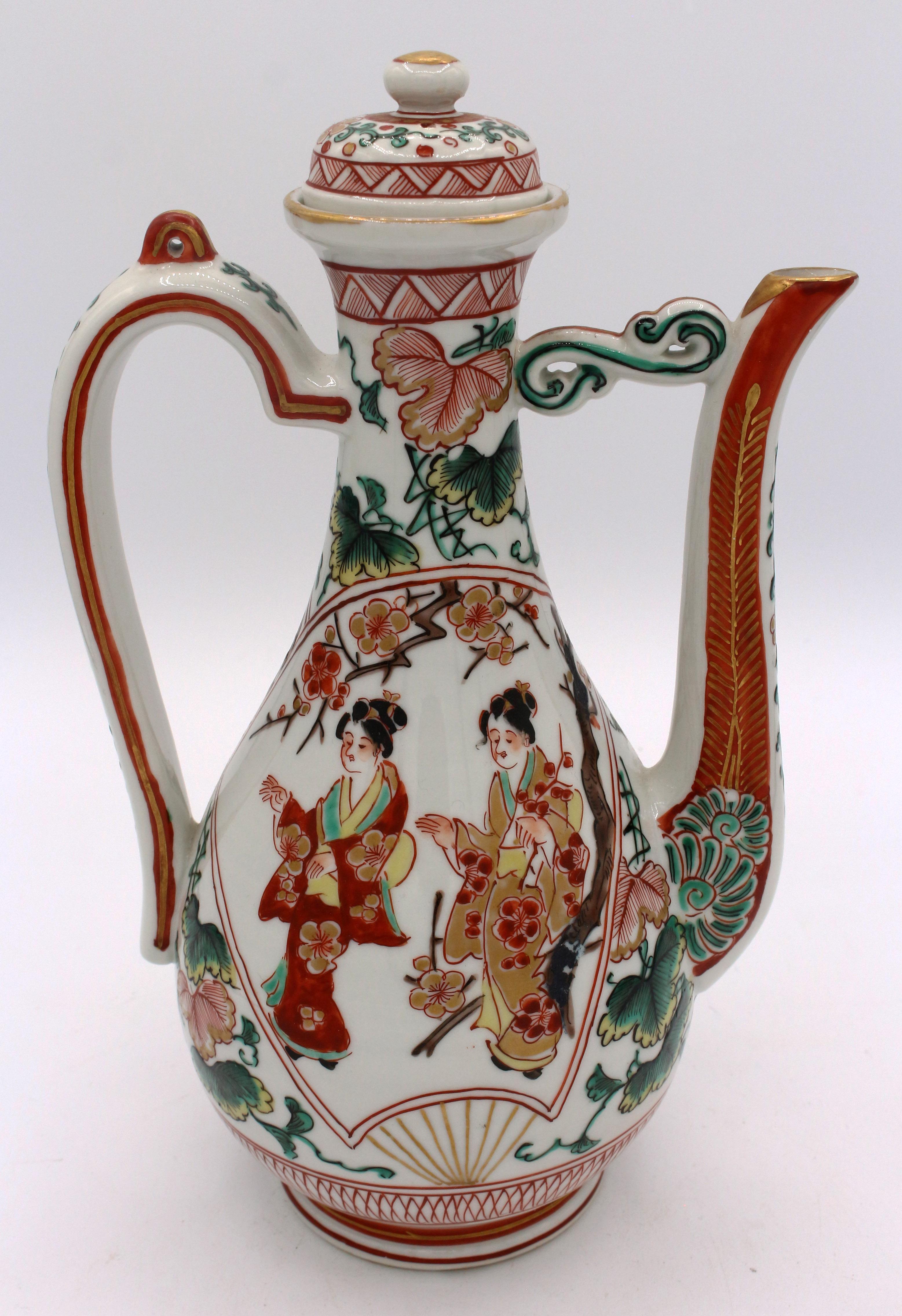 A Japanese, Meiji period, porcelain wine ewer. Fans set off the figural reserves. This is the finest & earliest of the 