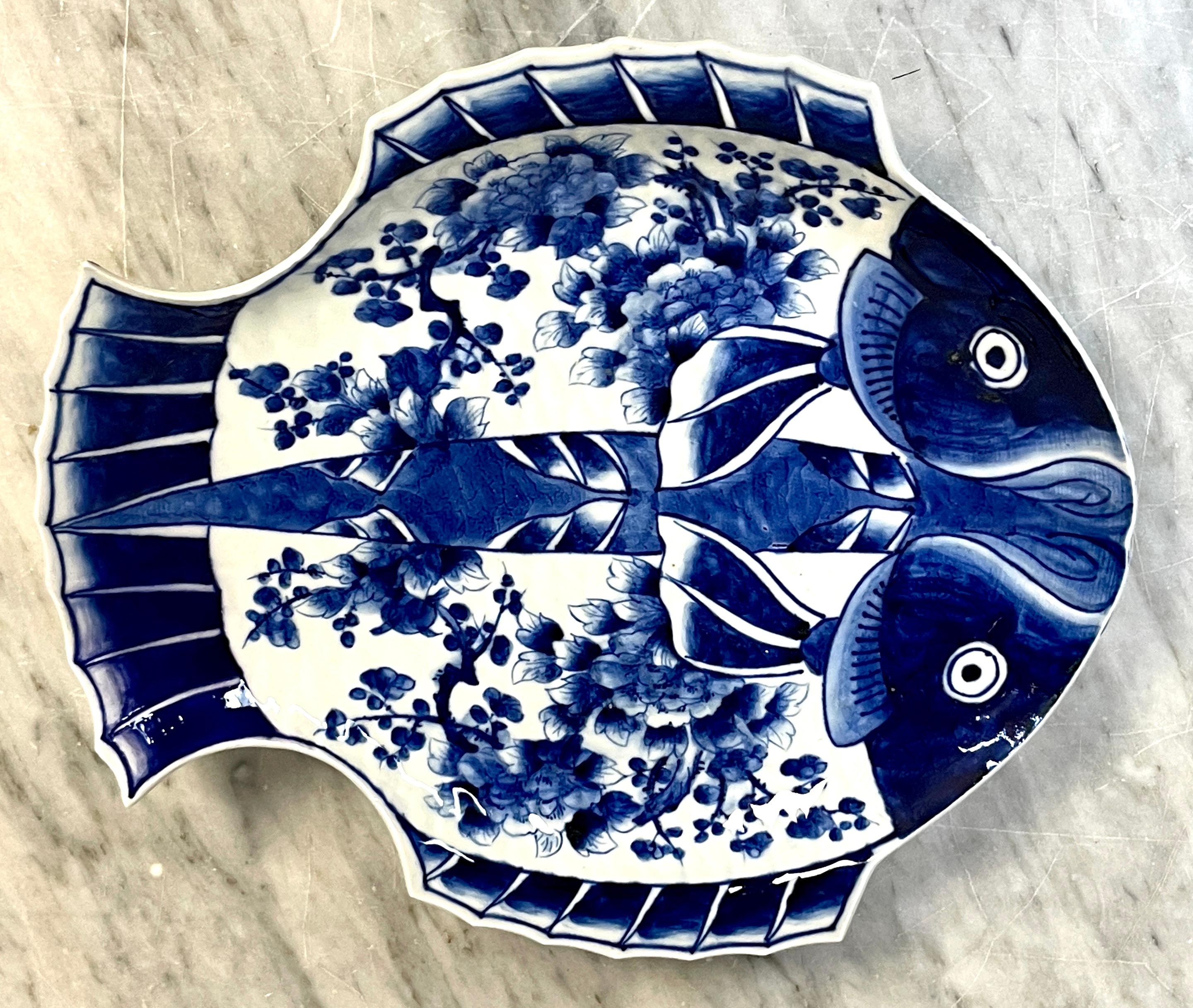 Meiji Period signed Fukagawa blue & white fish 'Flounder' plate
Japan Circa 1900s
We are pleased to offer a rare two -headed (flounder) blue and white signed Fukagawa fish plate measuring 11 inches-wide x 10-inches high
With decorated back, and