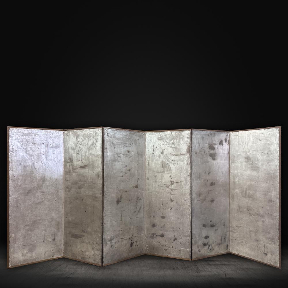 Silver Oxidized Screen

This exceptional oxidized silver leafed screen makes for an ideal enhancement to contemporary interiors. The original shining silver look has changed with natural oxidation over time, creating a one-of-a-kind abstract