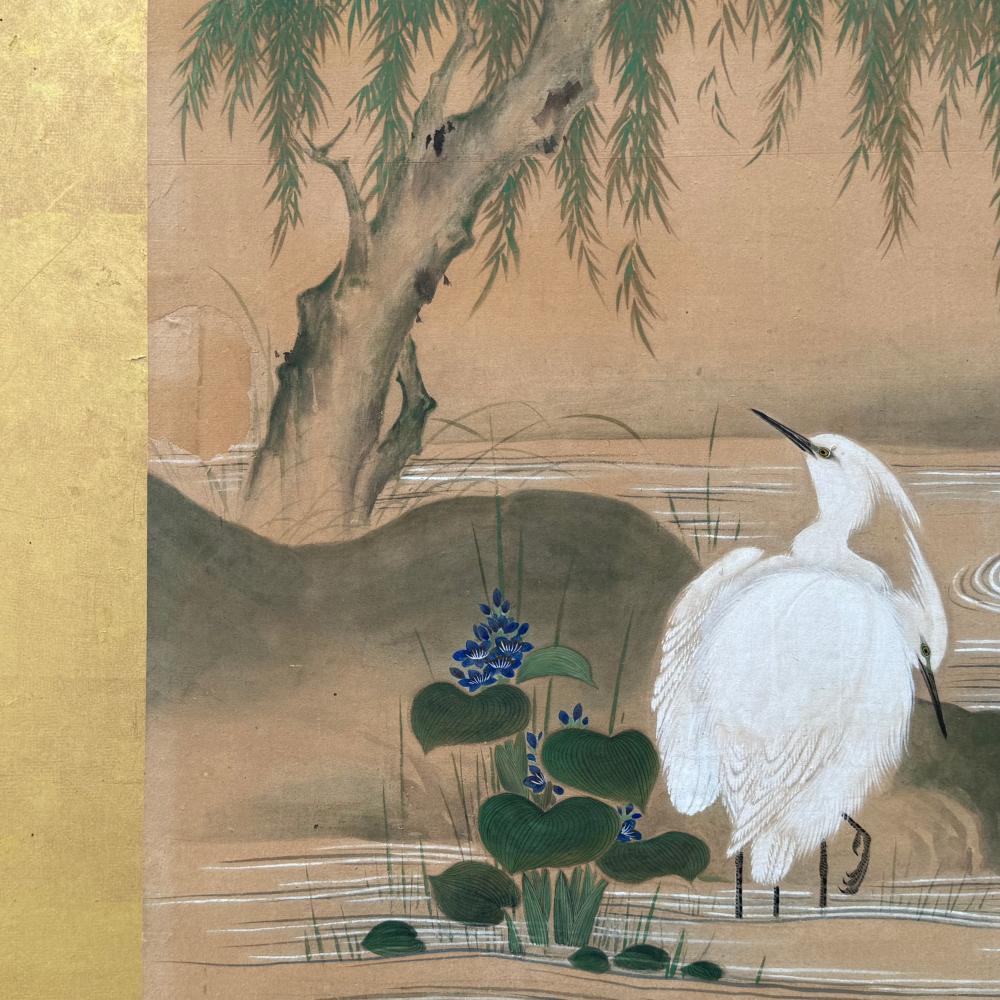 Meiji periof Nature scene with herons

Peroid: Meiji
Size: 154 x 155 cm (60.6 x 61 inches)
SKU: SD224

The artwork showcases a serene natural landscape that harmoniously blends various elements of traditional Japanese art. It features gracefully